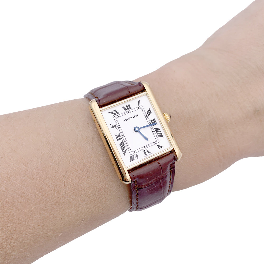 Cartier "Tank Louis Cartier" watch, yellow gold, leather.