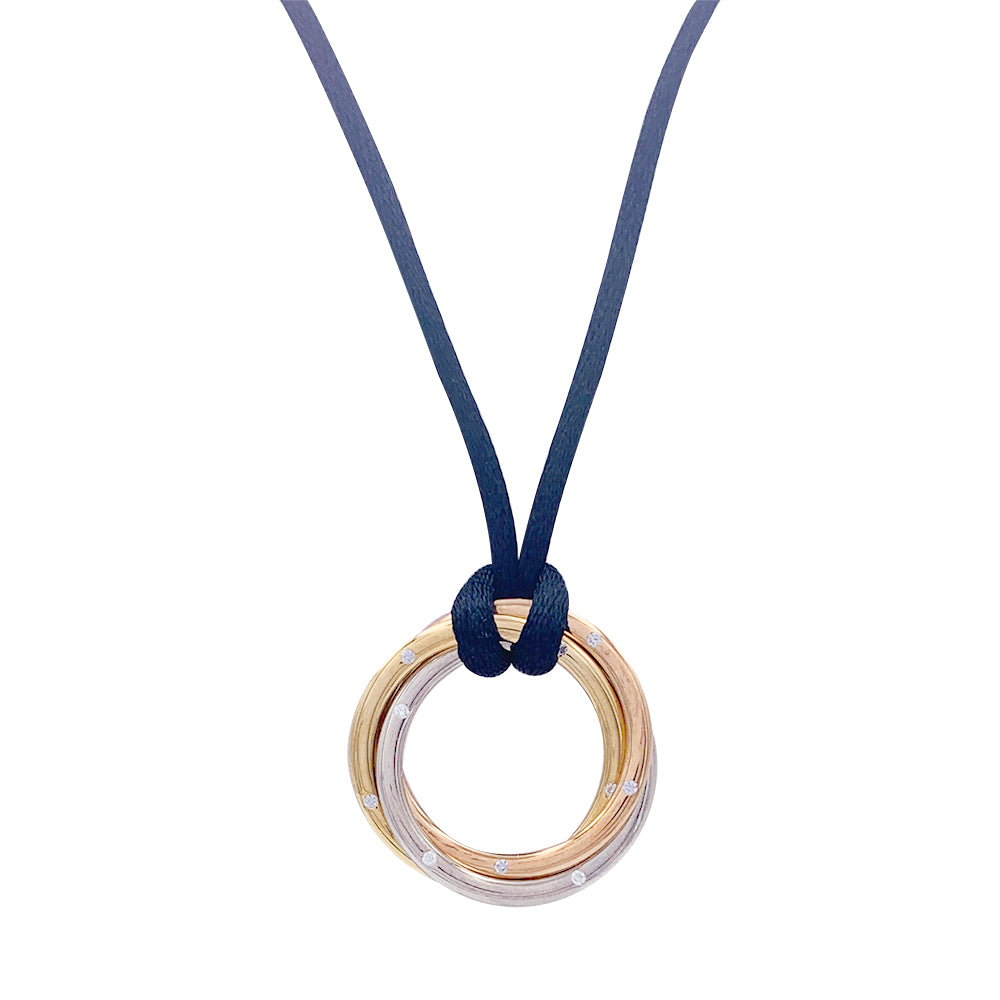 Cartier necklace, "Trinity", three golds, diamonds.