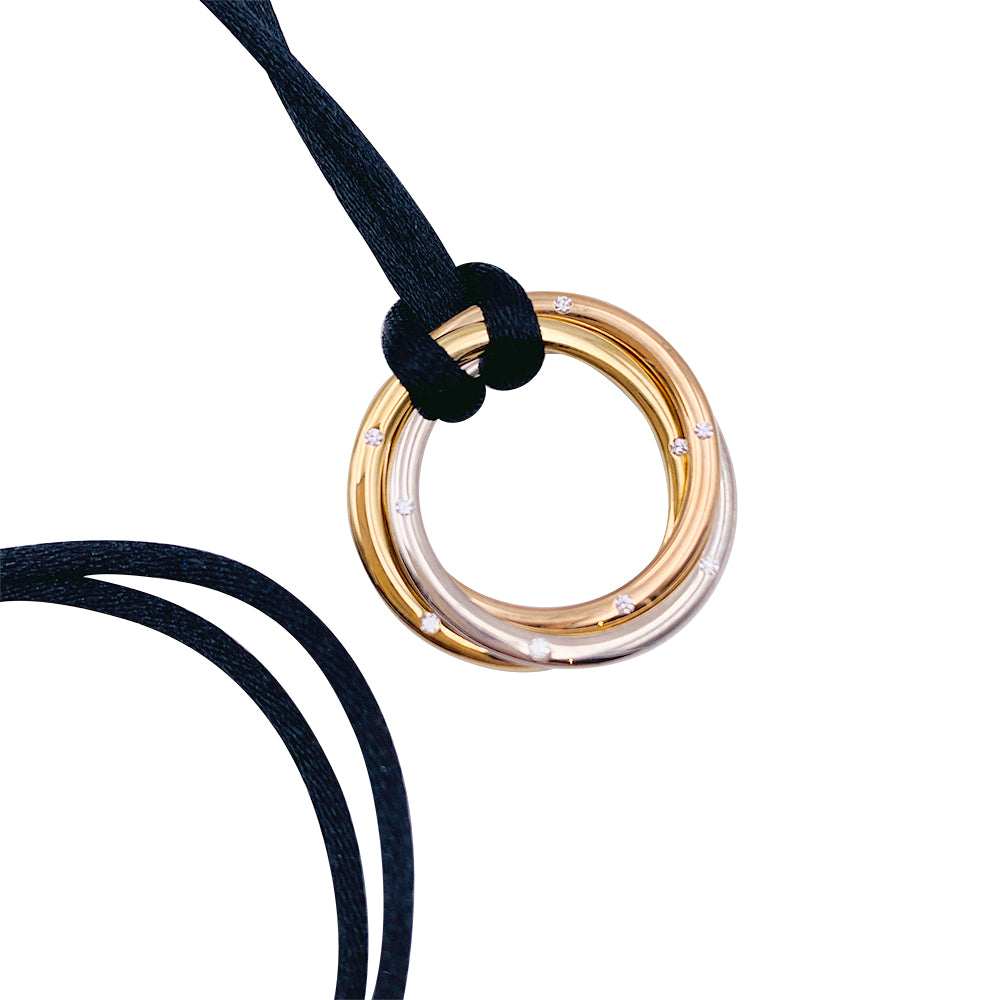 Cartier necklace, "Trinity", three golds, diamonds.
