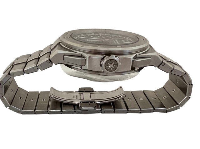 A Chopard Alpine Eagle Chrono steel watch with a blue background