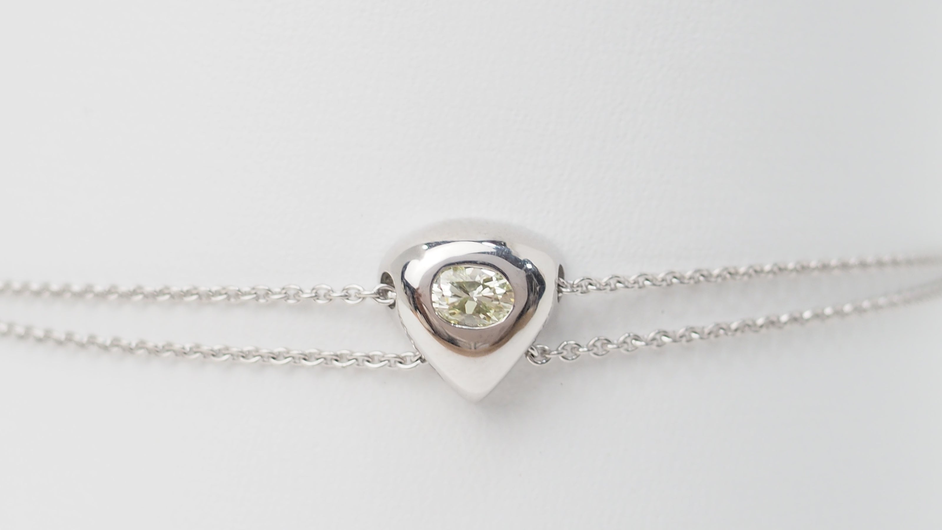 Bracelet coeur en or blanc et diamants