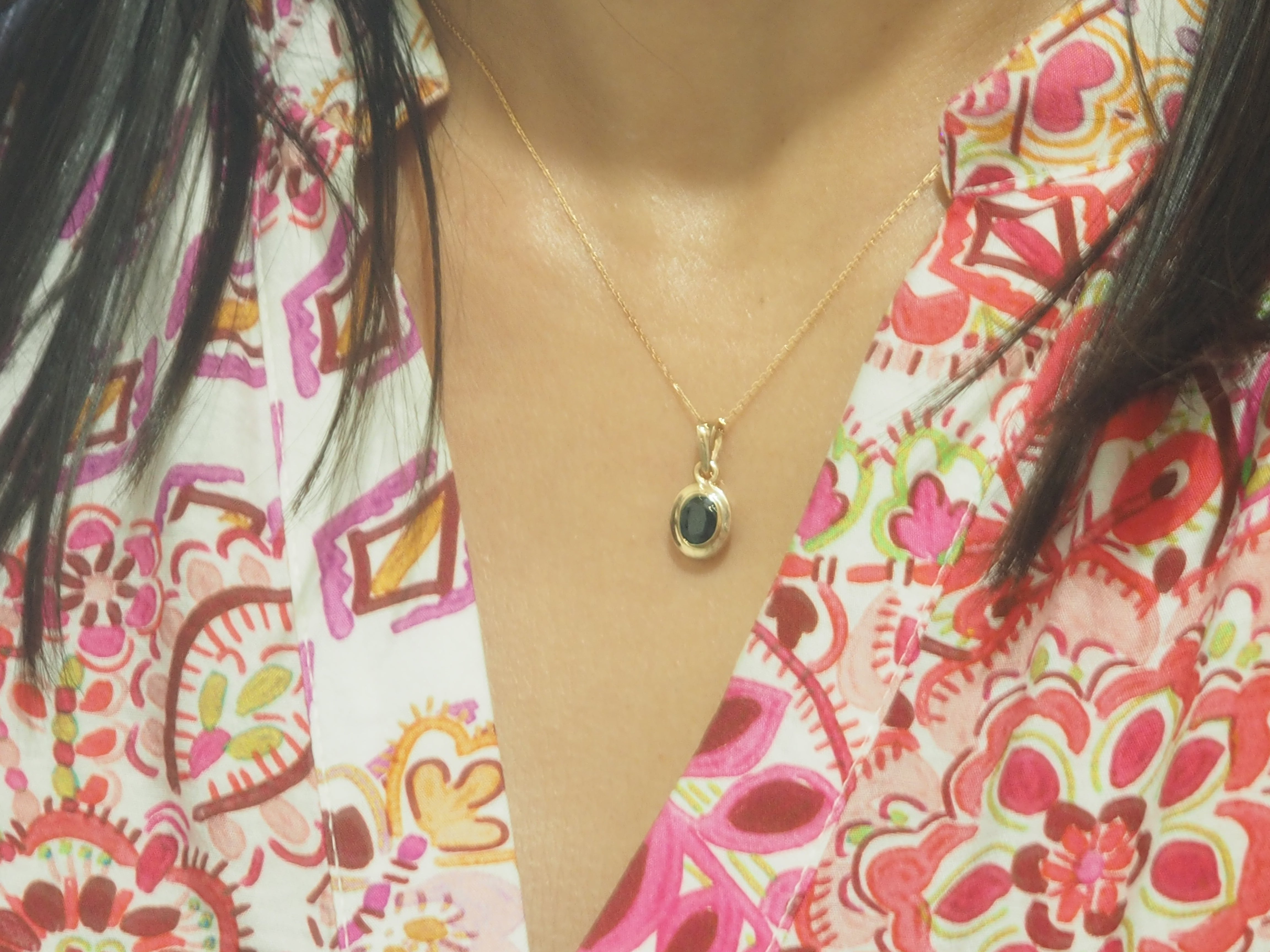 Collier pendentif en or rose et saphir