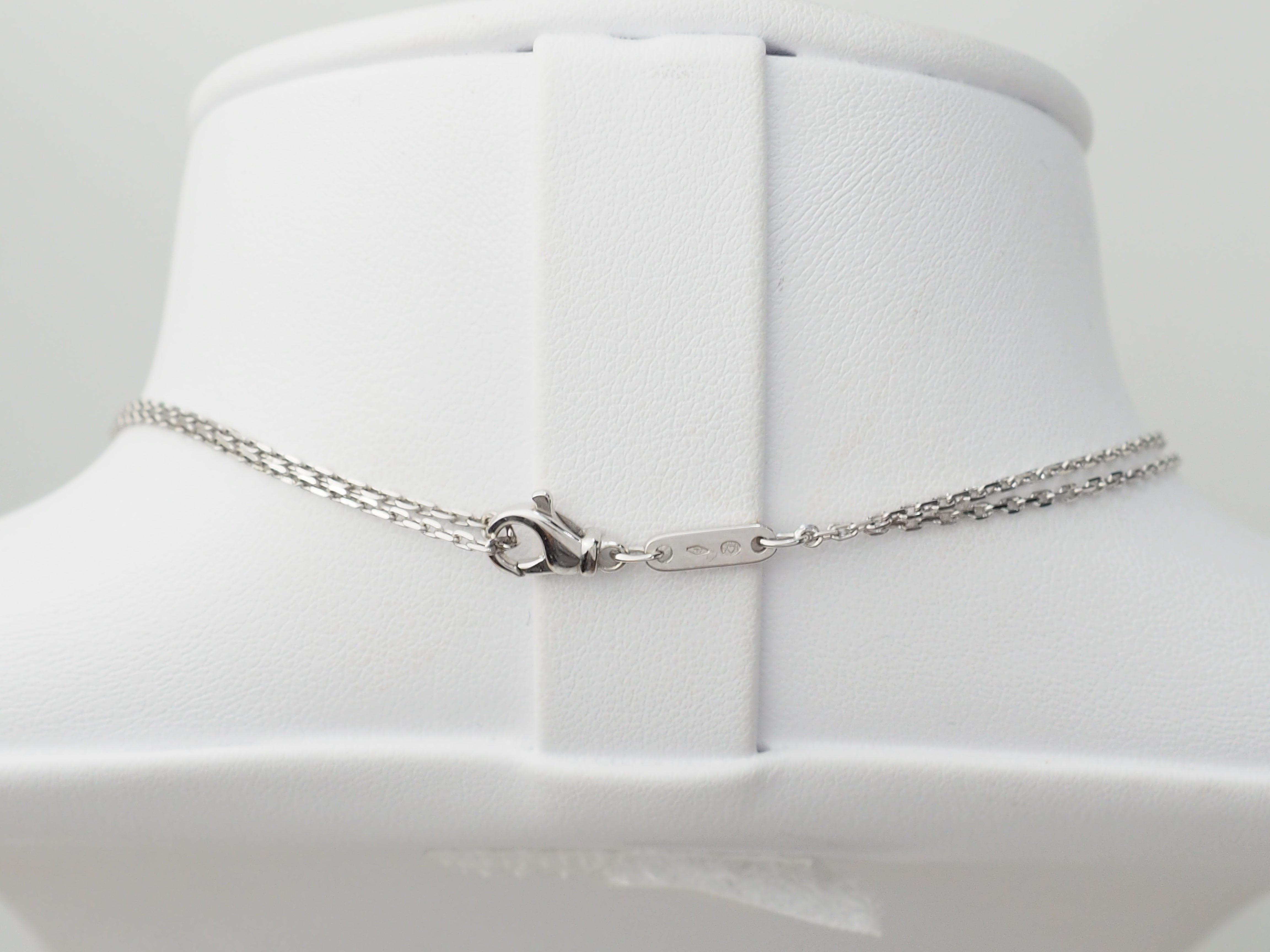 collier croix vintage en or blanc et diamants