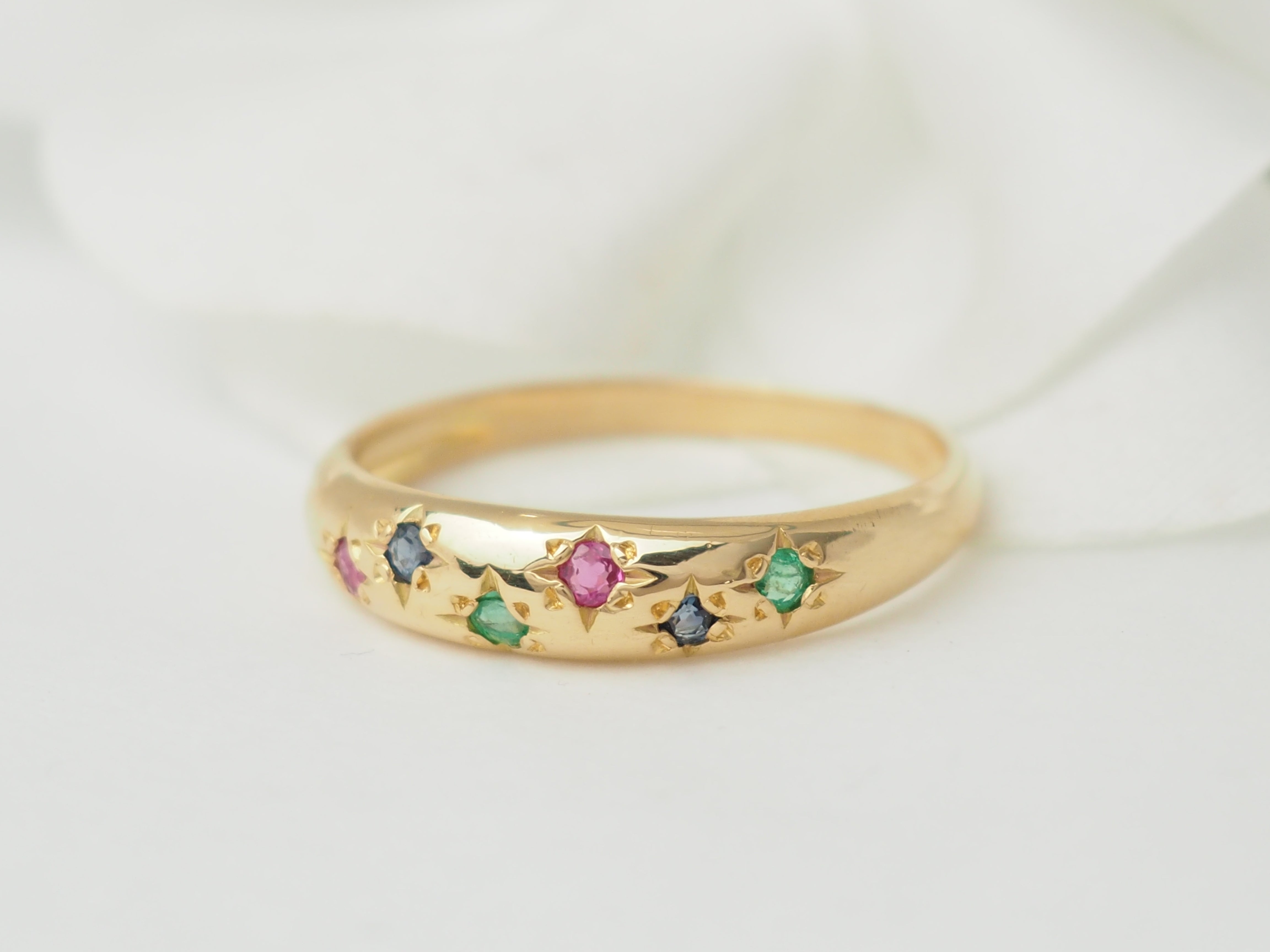 Bague jonc en or rose et pierres précieuses