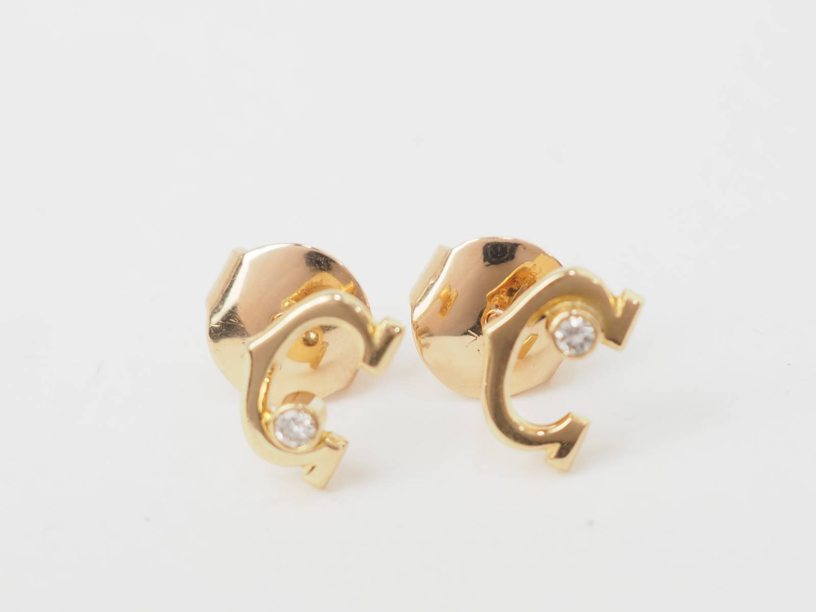 Boucles d'oreilles Cartier C en or jaune et diamants