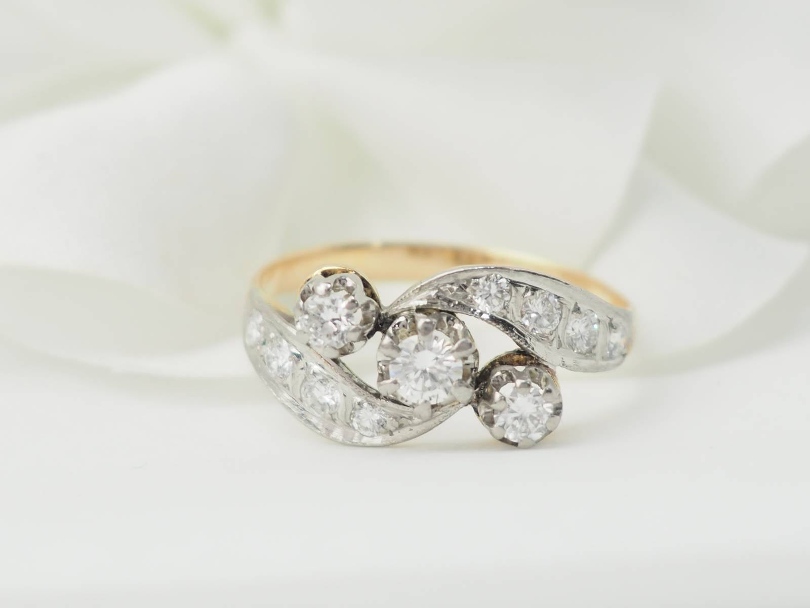 Bague ancienne en or bicolore et diamants