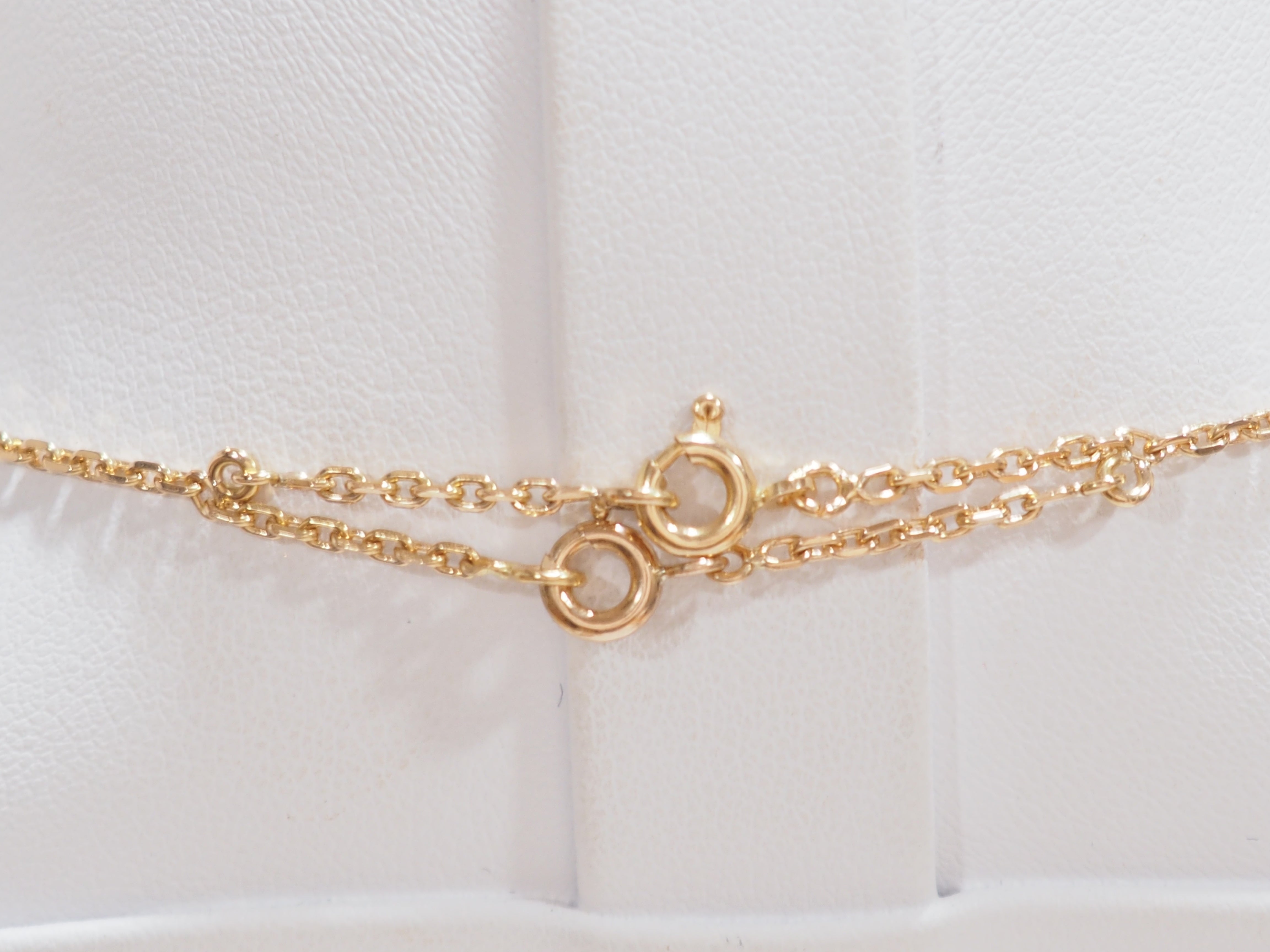 Collier pendentif en or jaune, émeraude et diamants