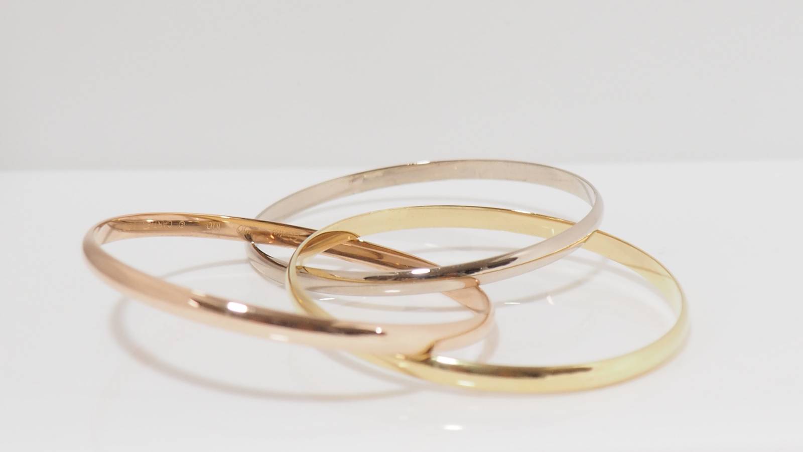 Bracelet Trinity de Cartier d'occasion trois ors