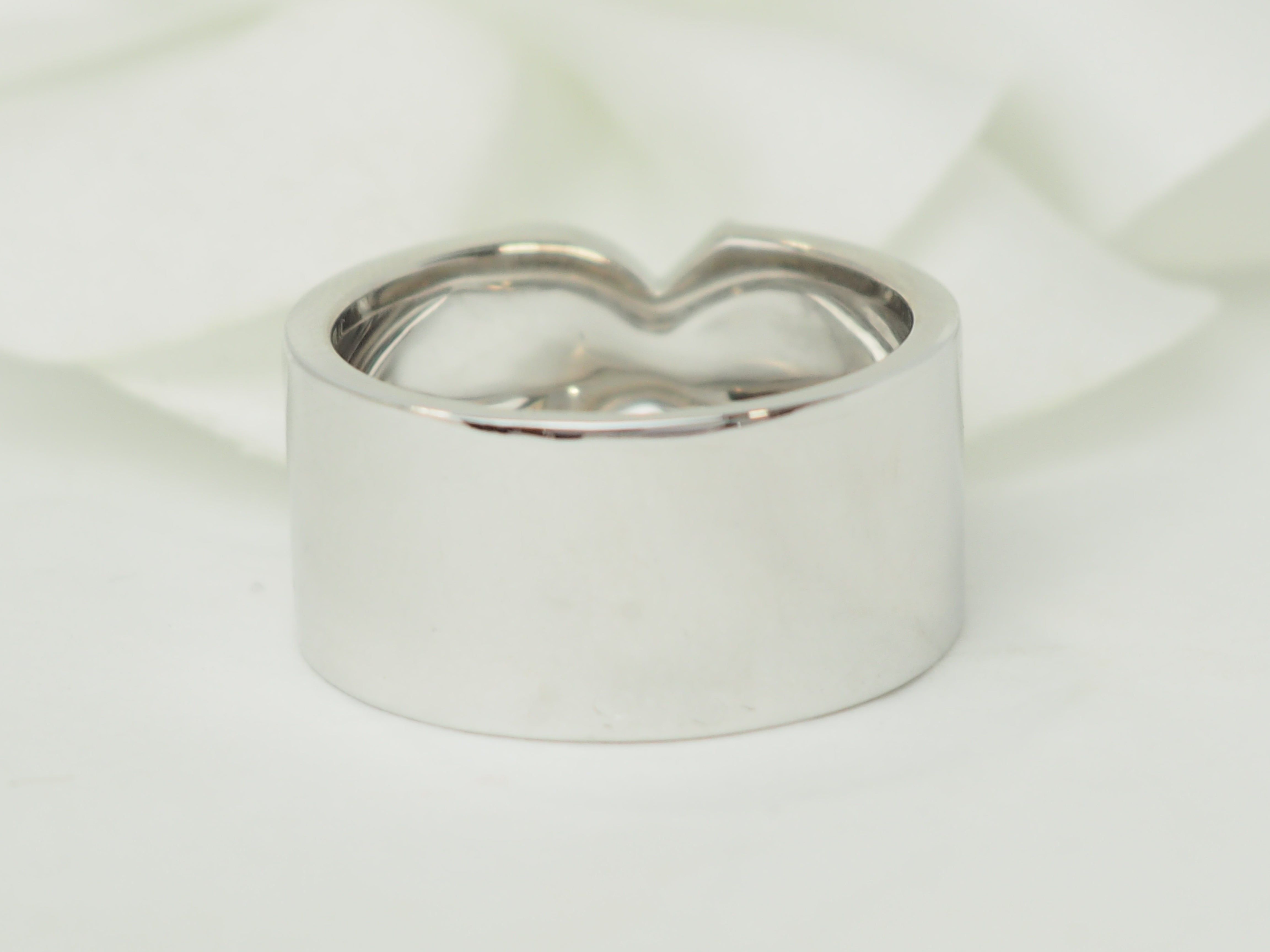 Bague vintage signée Fred "Fredkiss" en or blanc