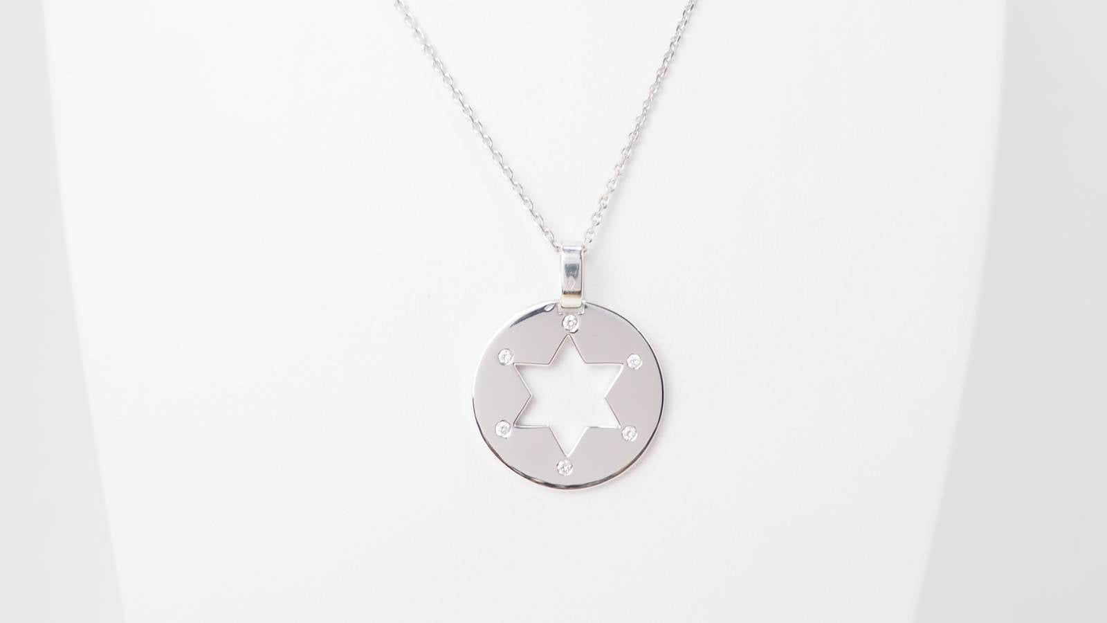 Collier pendentif étoile de David en or blanc et diamants
