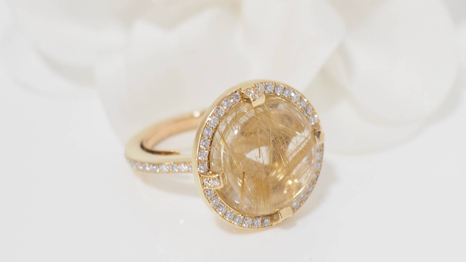 Chaumet ring in yellow gold, rutilated quartz and diamonds