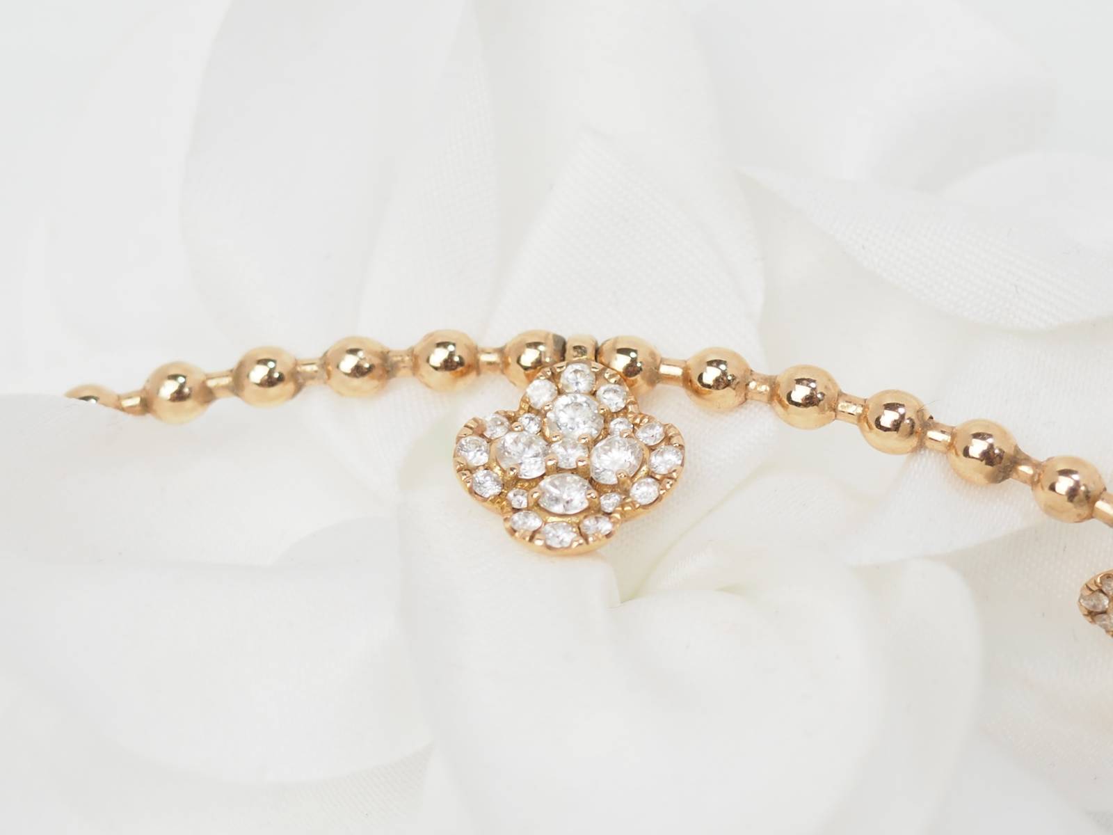 Collier boules rigide et trèfles en or rose et diamants