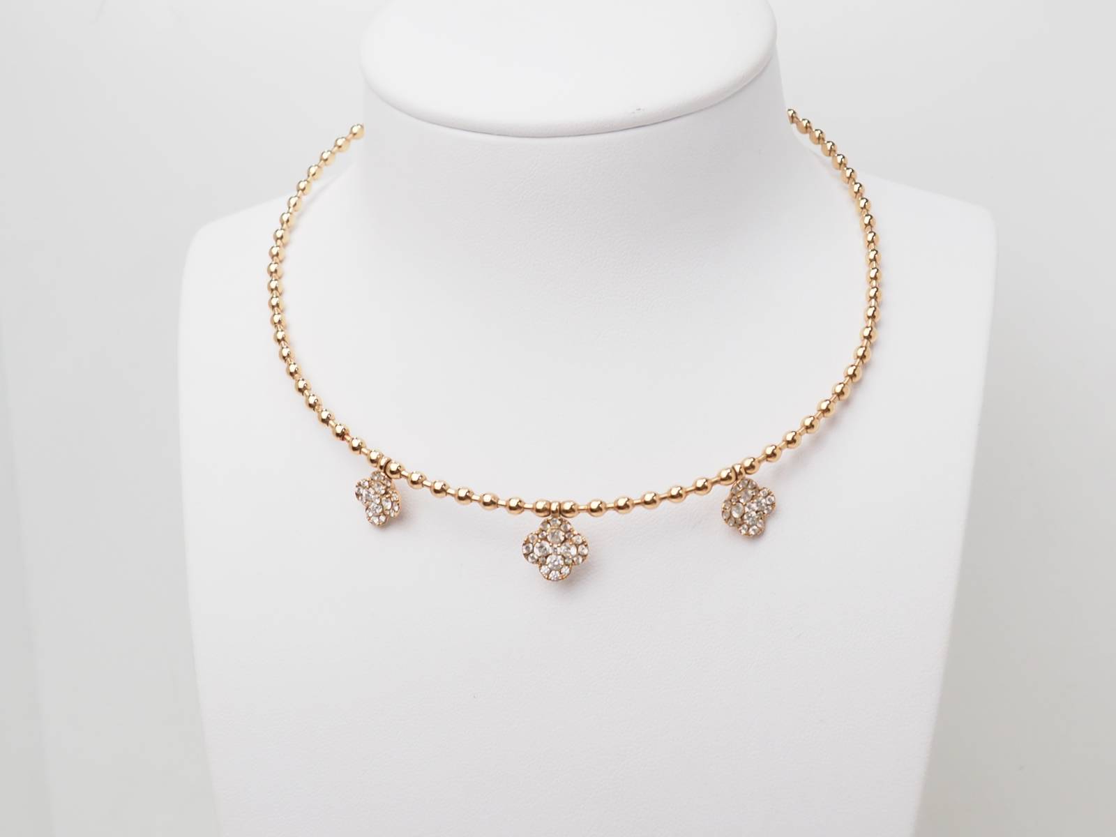 Collier boules rigide et trèfles en or rose et diamants