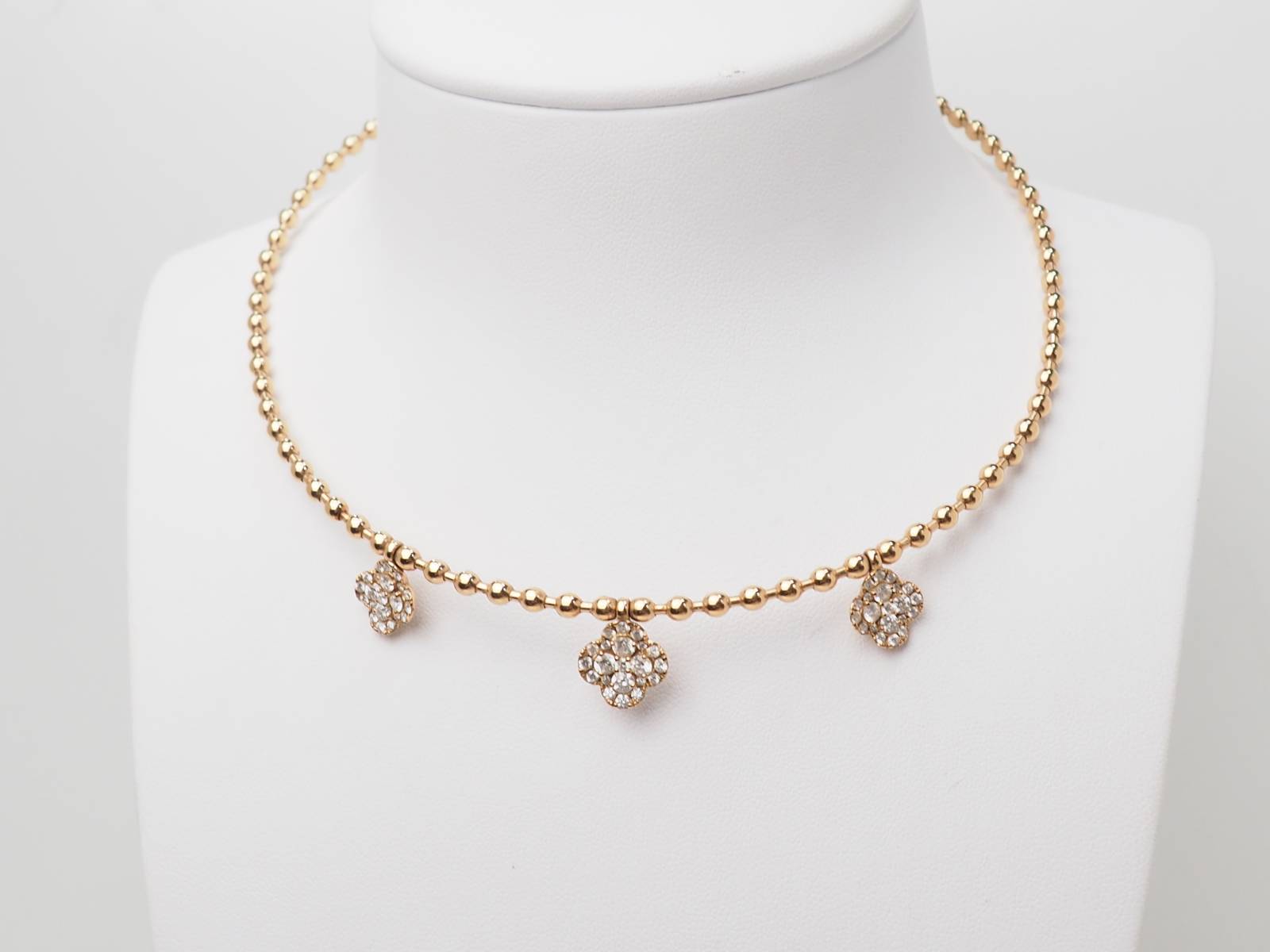 Collier boules rigide et trèfles en or rose et diamants