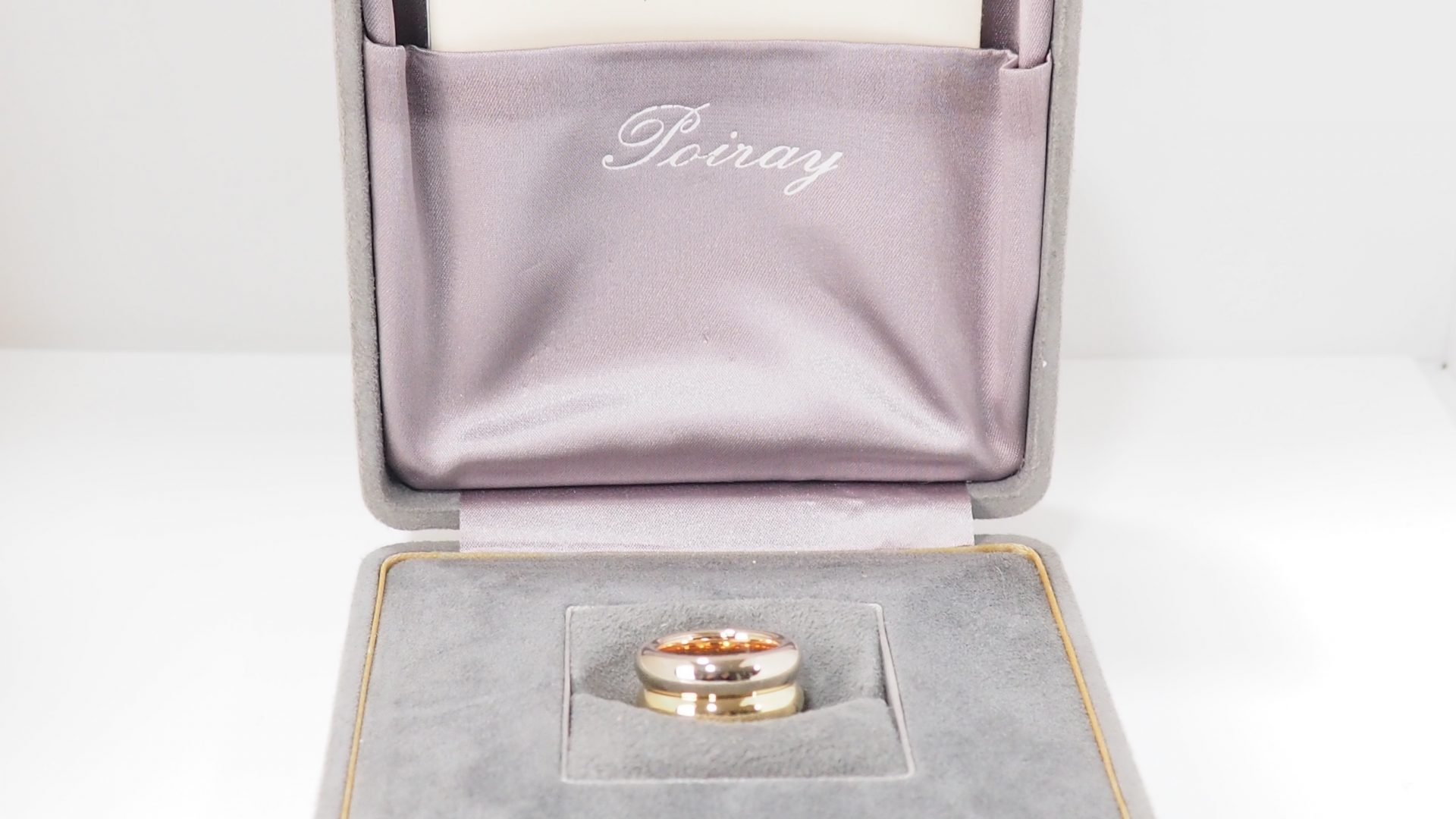Poiray "Symbol" ring in three golds