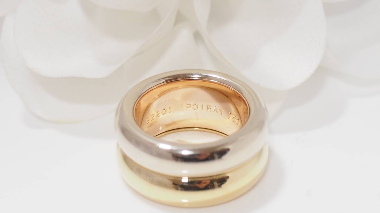 Poiray "Symbol" ring in three golds