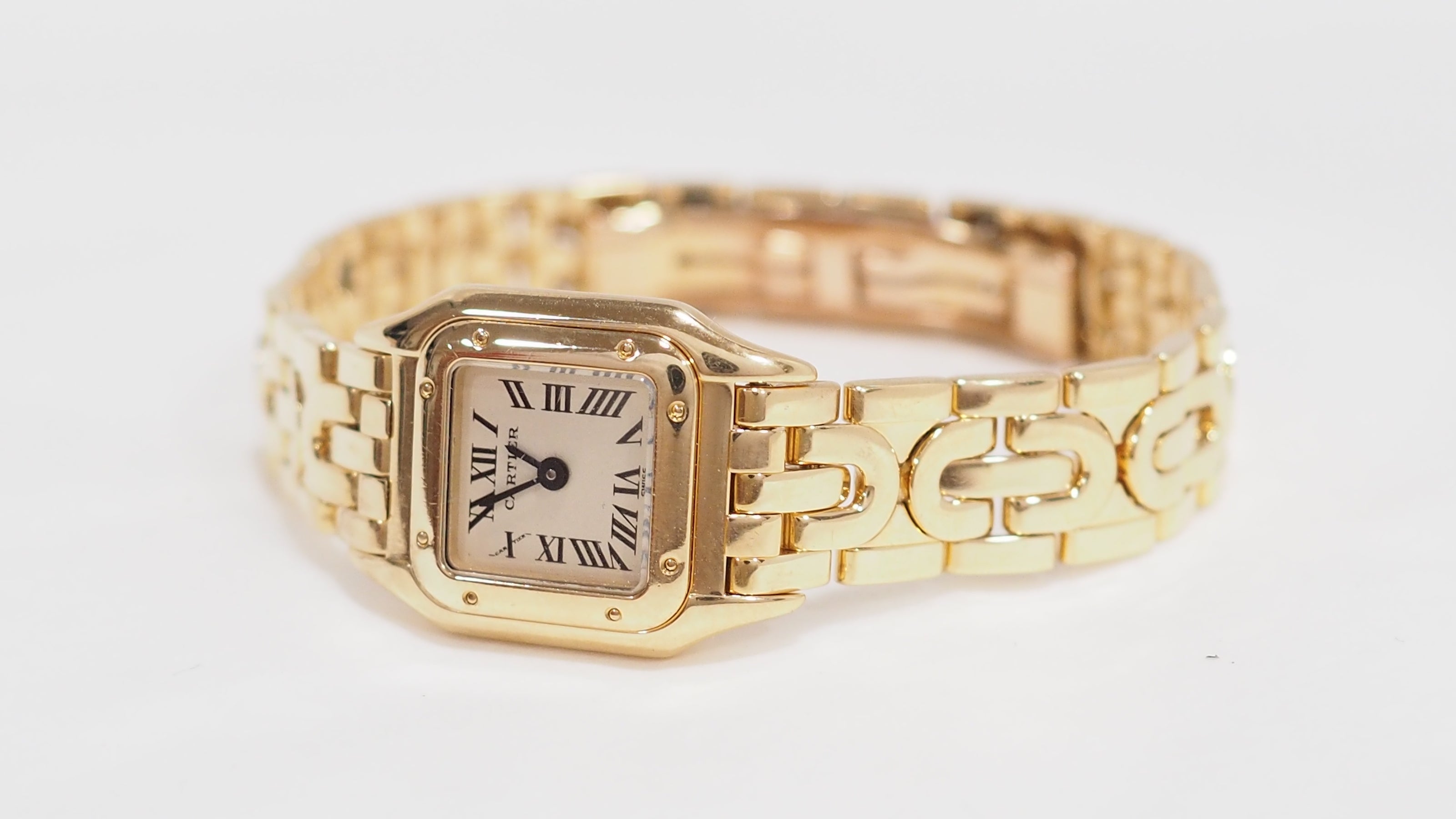 Montre Mini Panthère vintage de Cartier en or jaune