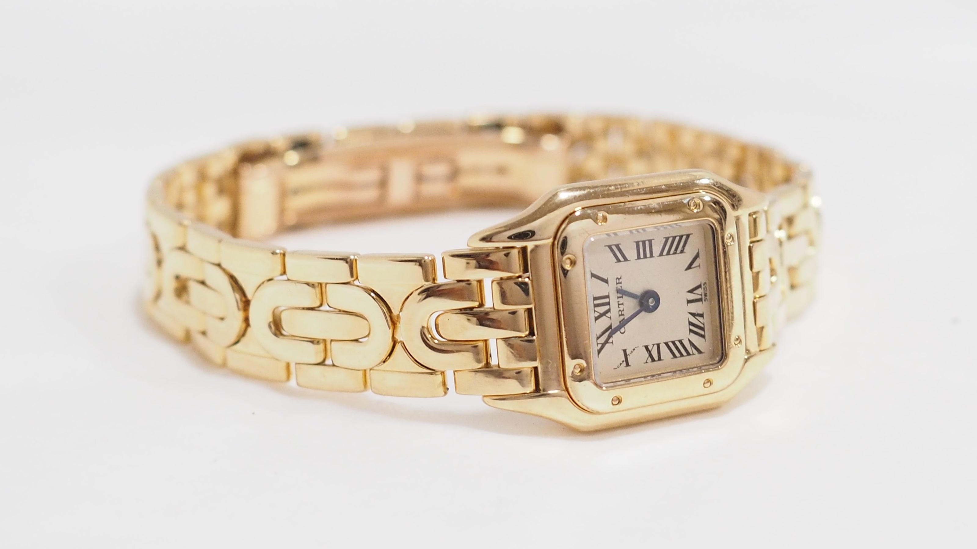 Montre Mini Panthère vintage de Cartier en or jaune