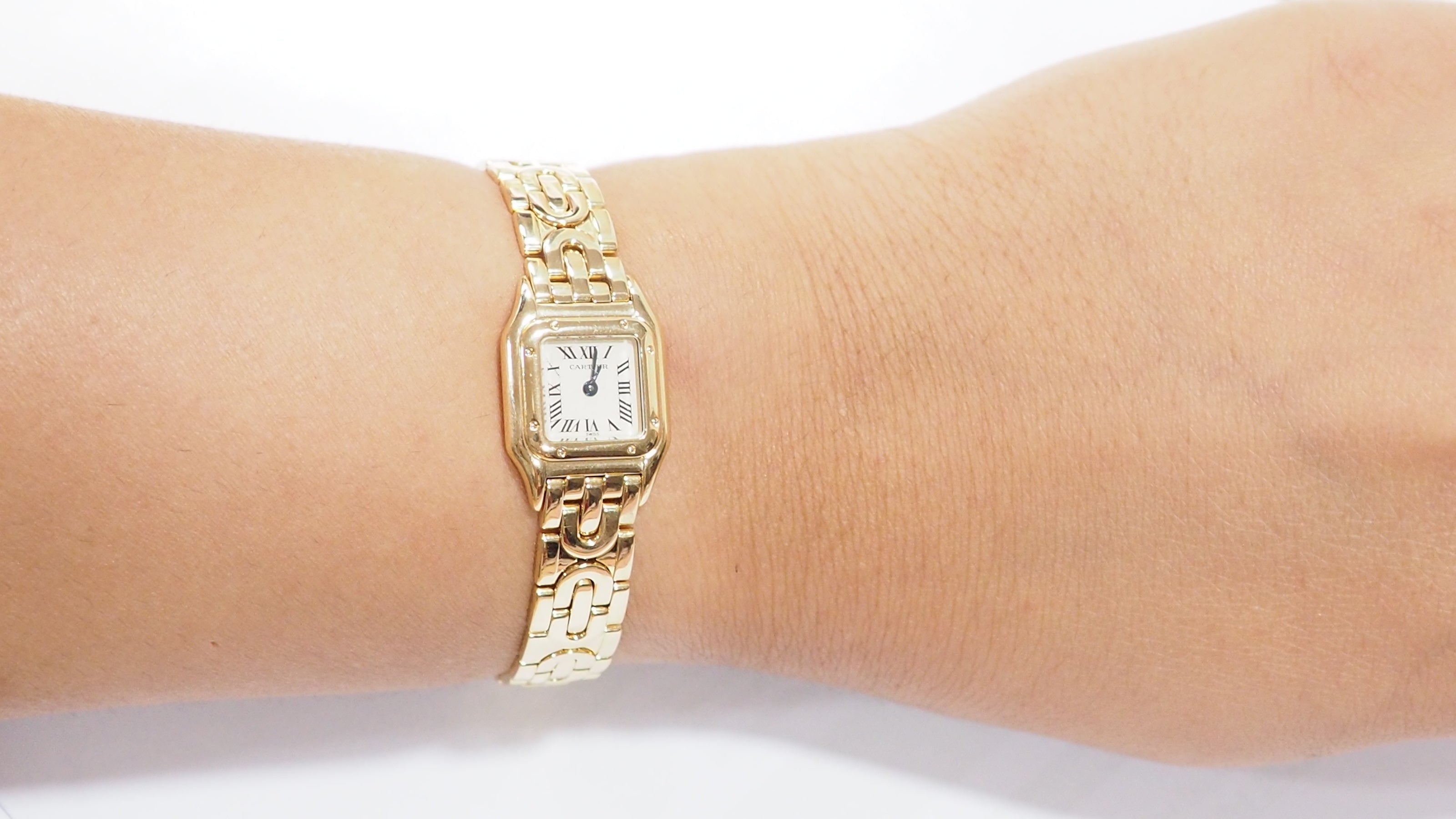 Montre Mini Panthère vintage de Cartier en or jaune