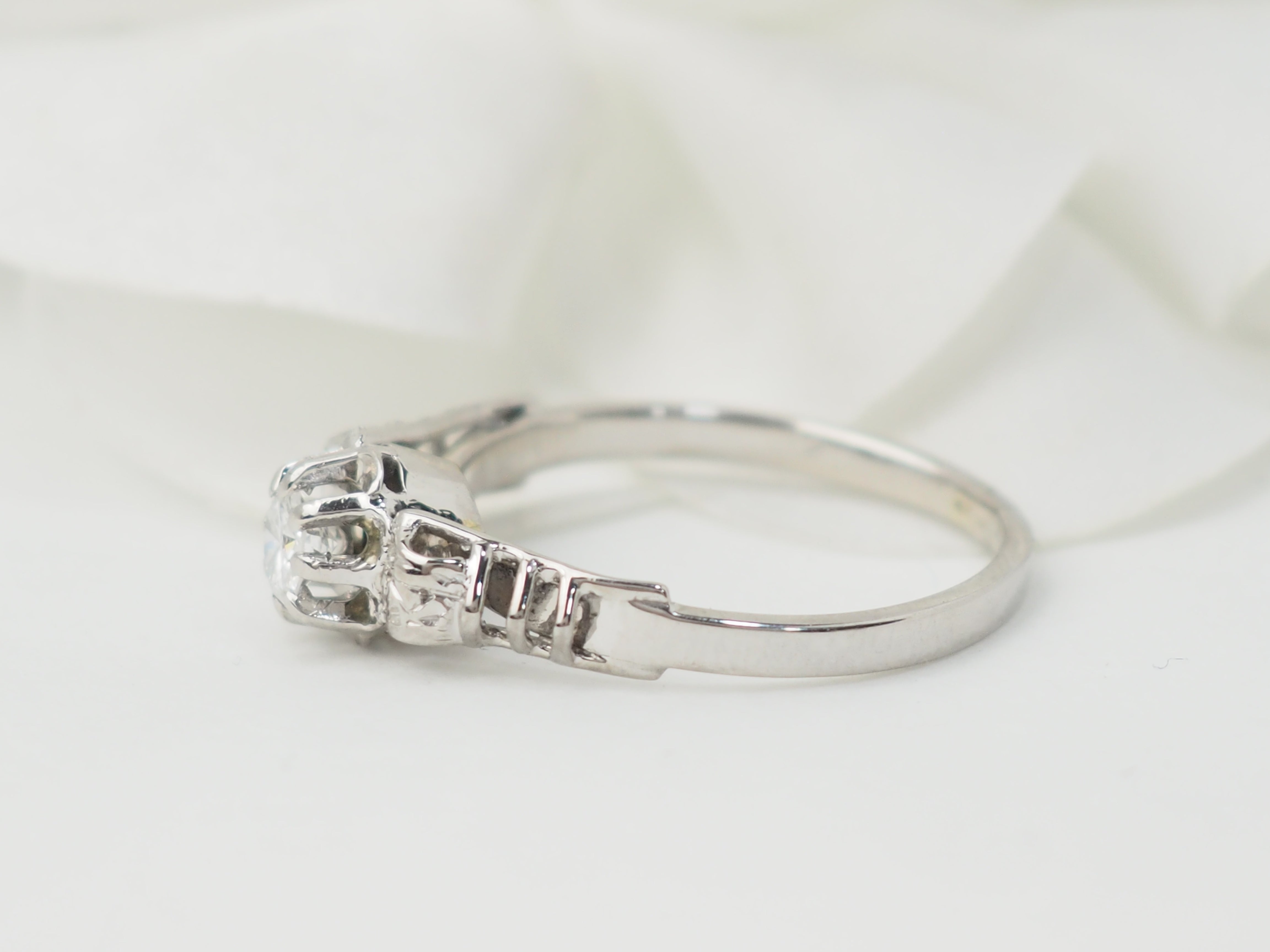 Bague solitaire en or blanc et platine, diamant 0,23ct