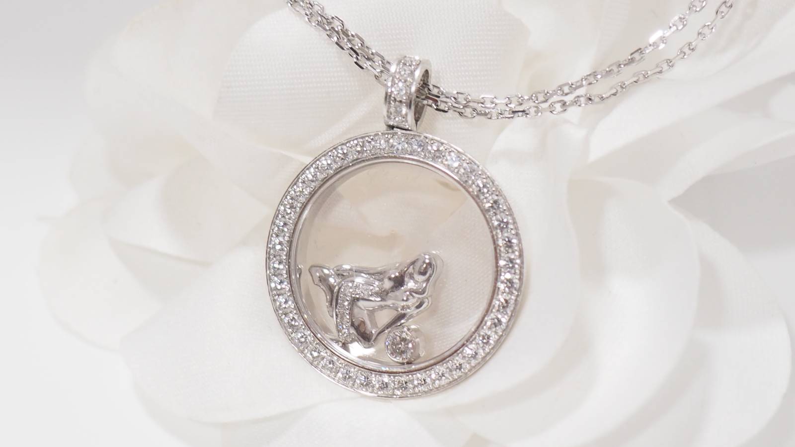 Collier Chopard "happy Diamonds" en or blanc et diamants