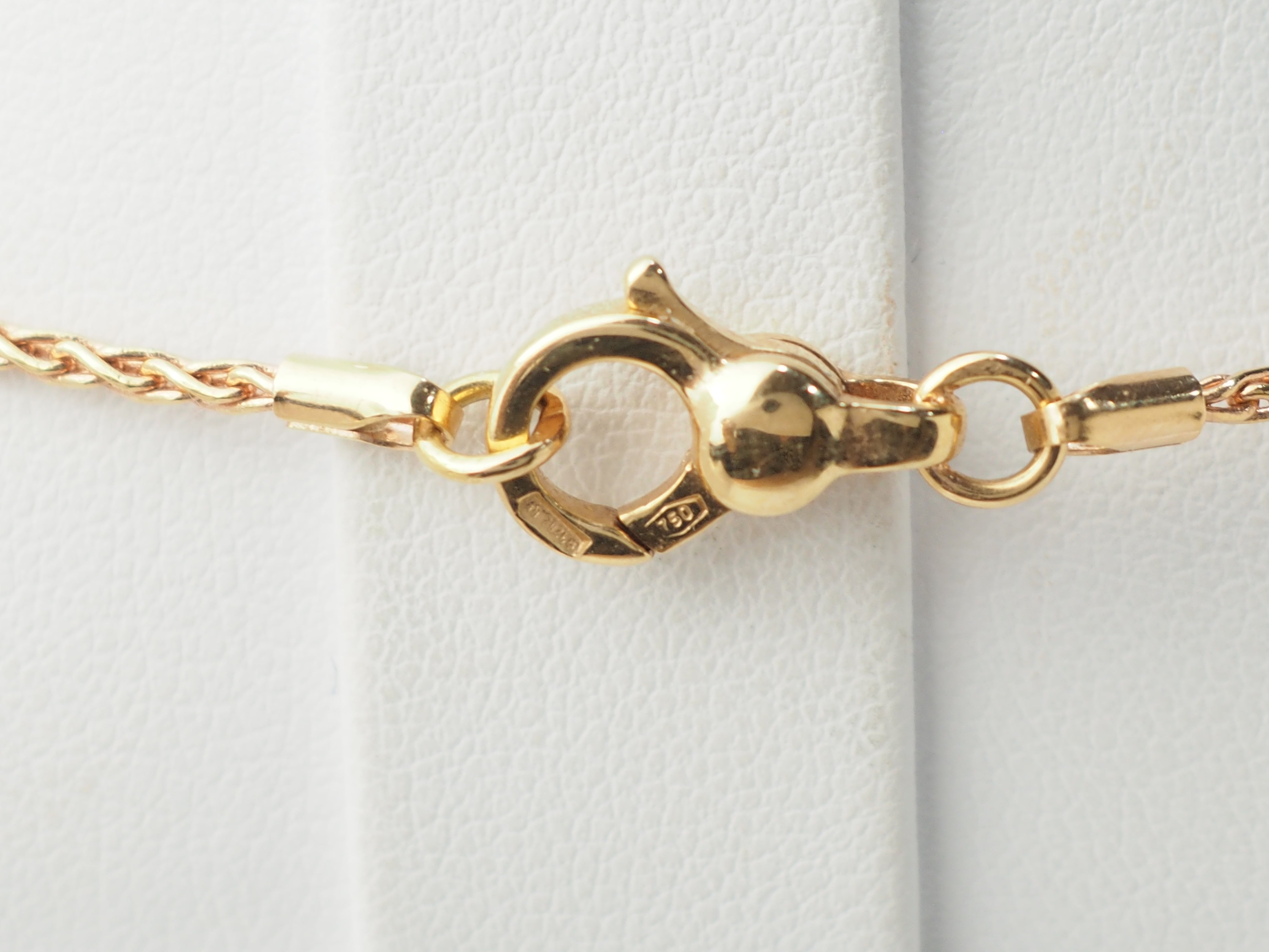 Collier pendentif fleur en or rose, pierres fines et diamants