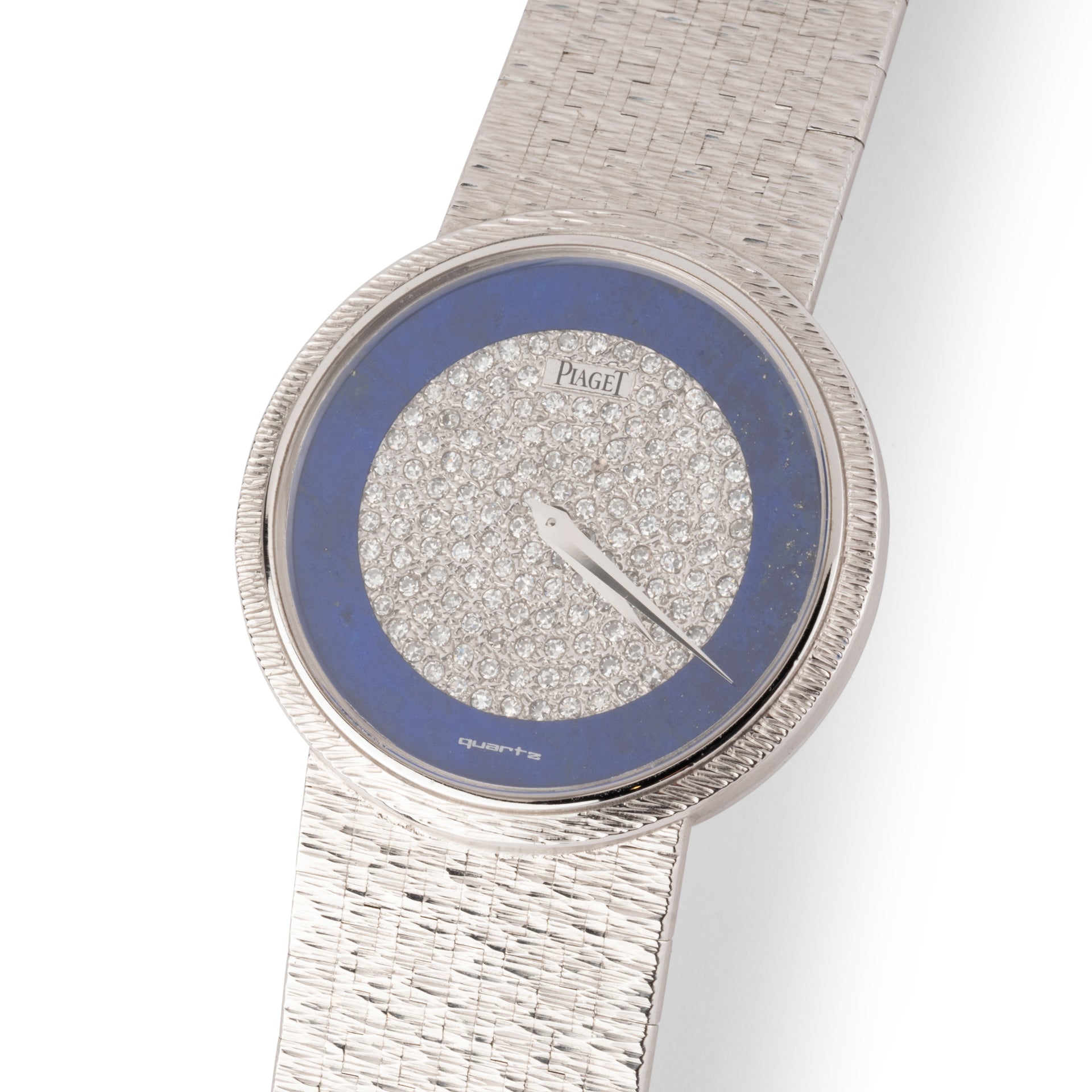 A Piaget watch in white gold, lapis lazuli and diamonds