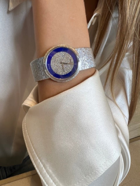 A Piaget watch in white gold, lapis lazuli and diamonds