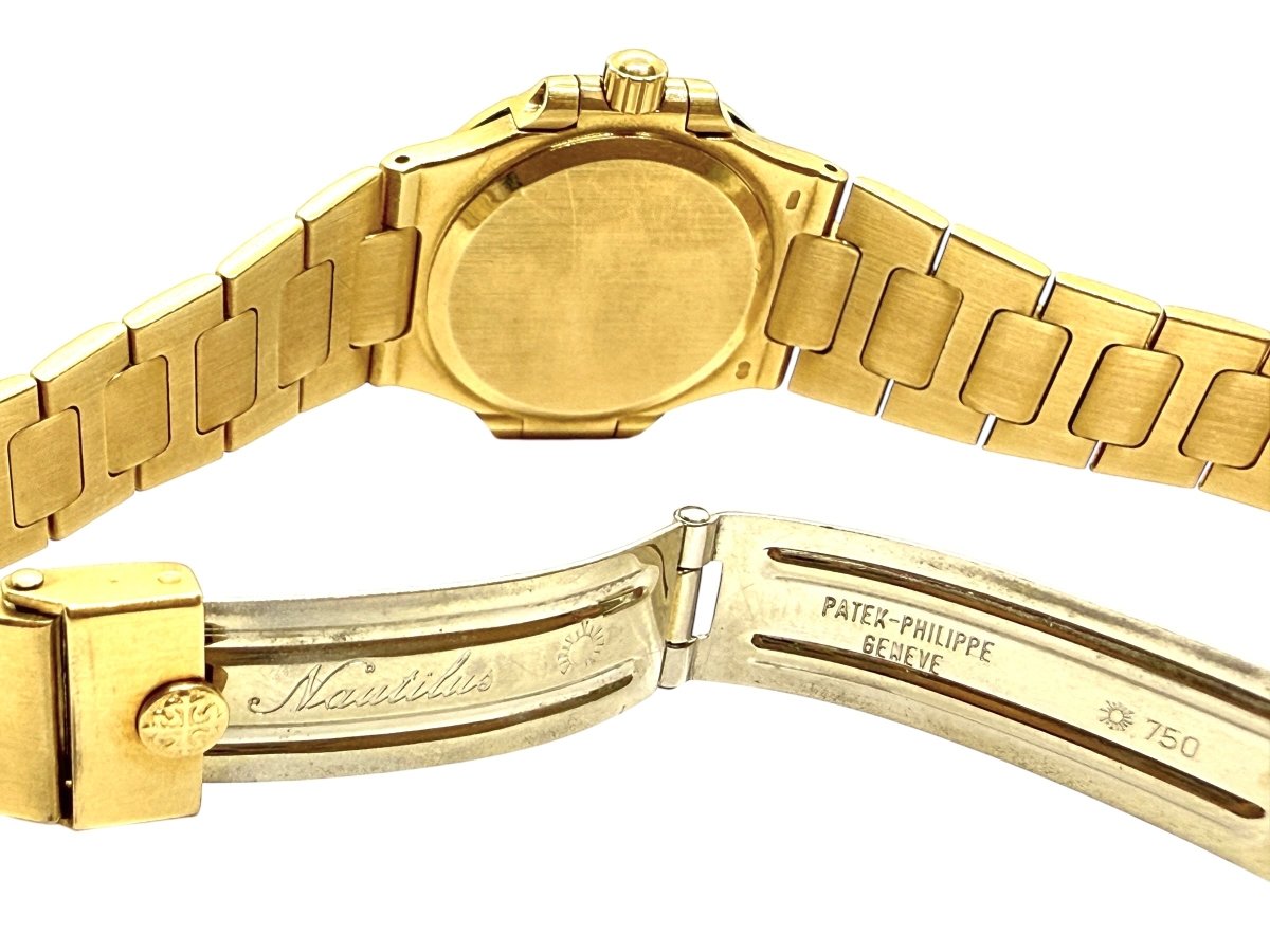 Patek Philippe montre Nautilus vintage or jaune 18K - Maison Eloe