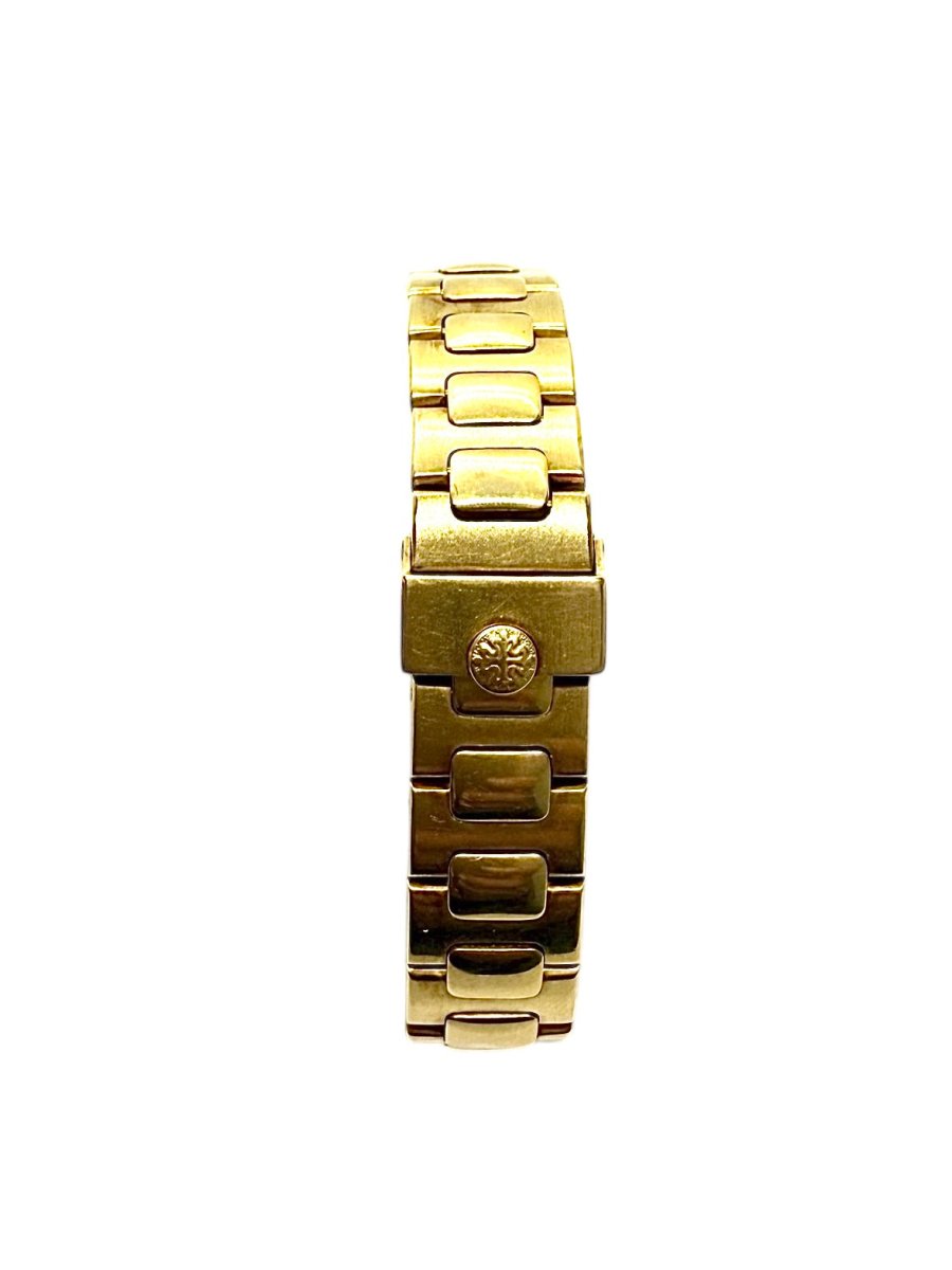 Patek Philippe montre Nautilus vintage or jaune 18K - Maison Eloe