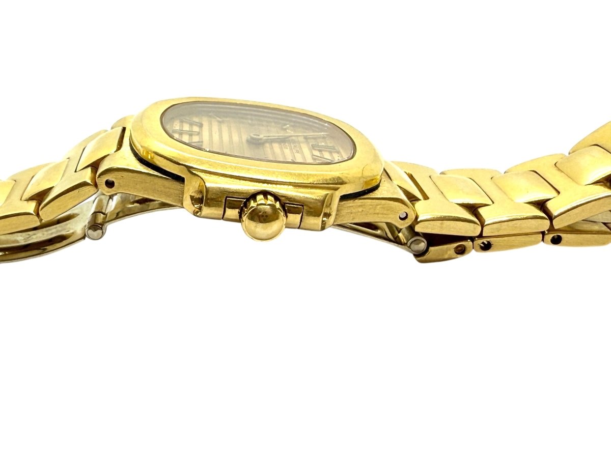 Patek Philippe montre Nautilus vintage or jaune 18K - Maison Eloe