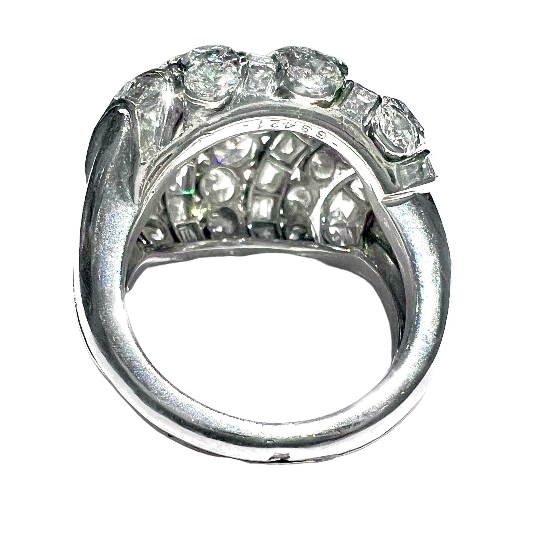 Ring signed Van Cleef & Arpels, platinum and diamonds.
