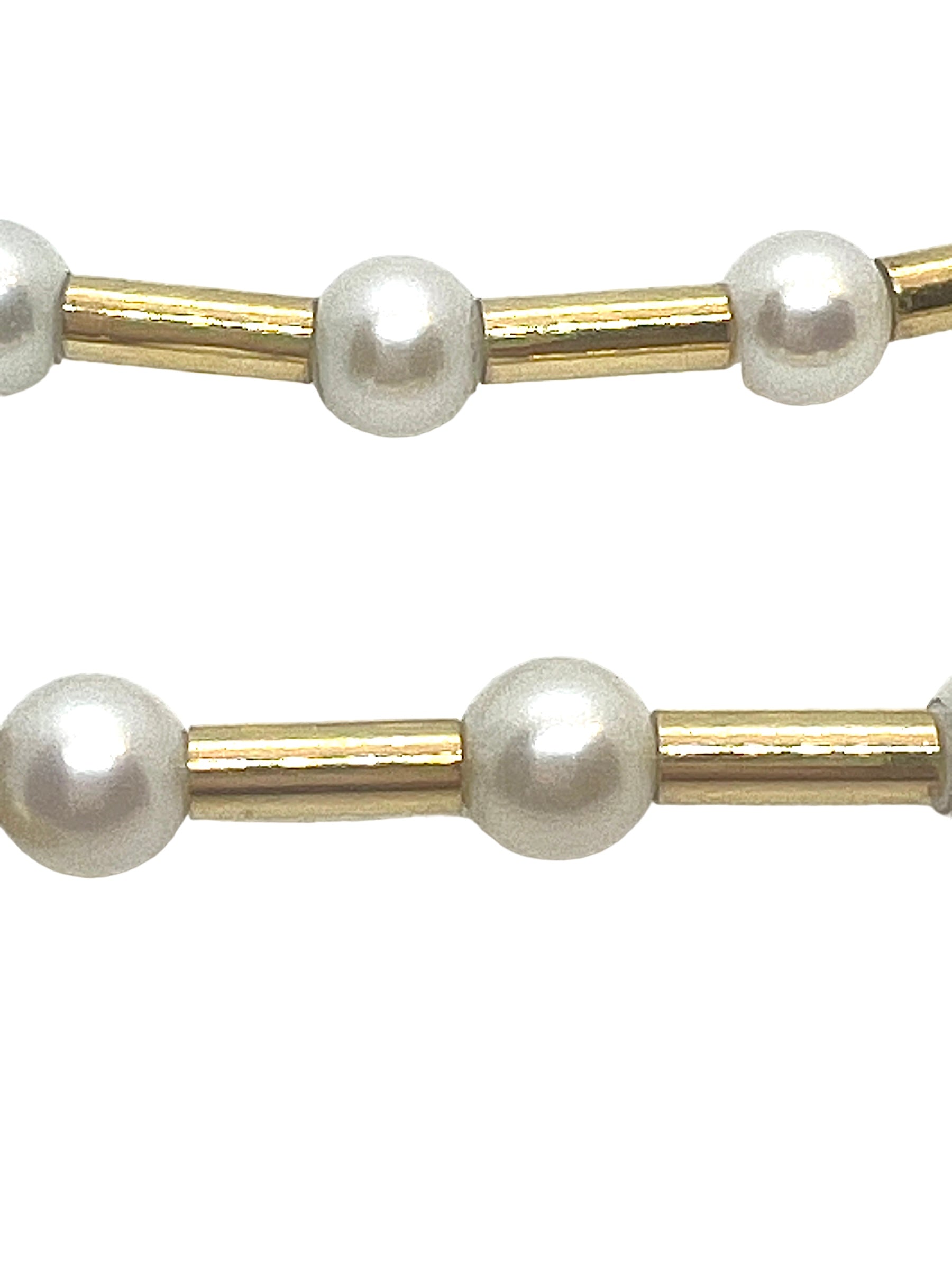 Poiray, "Fuseau" necklace in 18K yellow gold and cultured pearls