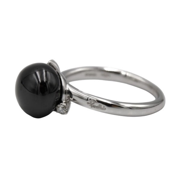 Pomellato, "Capri" ring in 18k white gold set with a black ceramic pearl and 3 diamonds