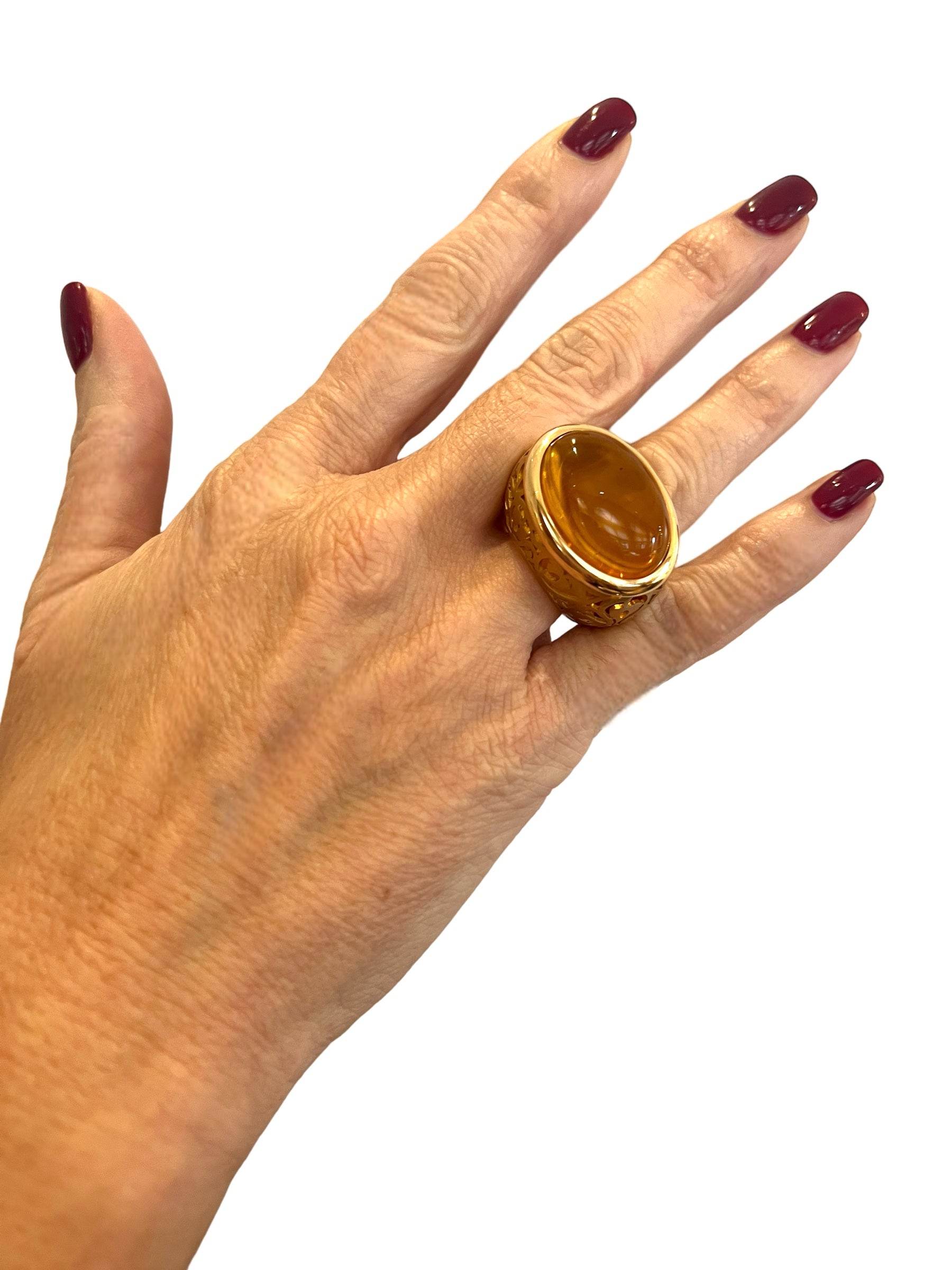 Pomellato, "Arabesque" ring with Amber Cabochon on Rose Gold