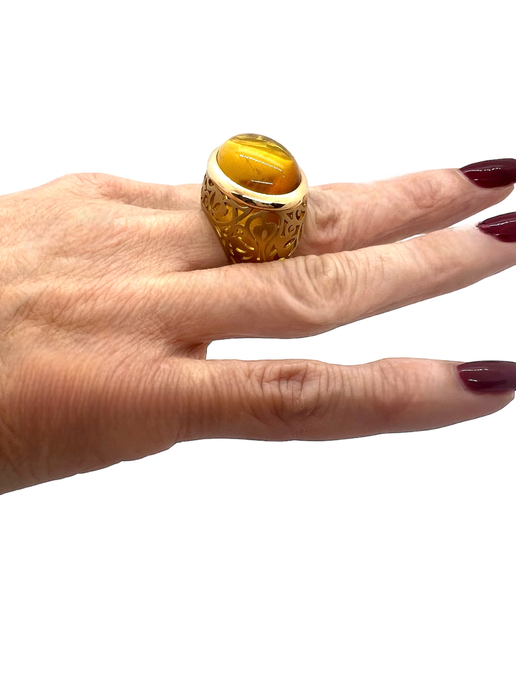 Pomellato, "Arabesque" ring with Amber Cabochon on Rose Gold