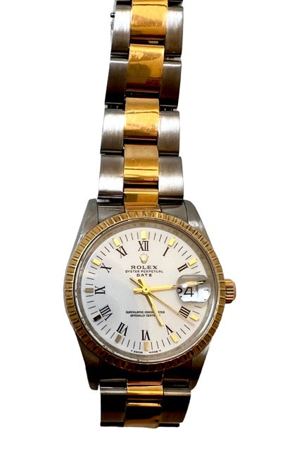 Rolex date watch in yellow gold and steel from 1990