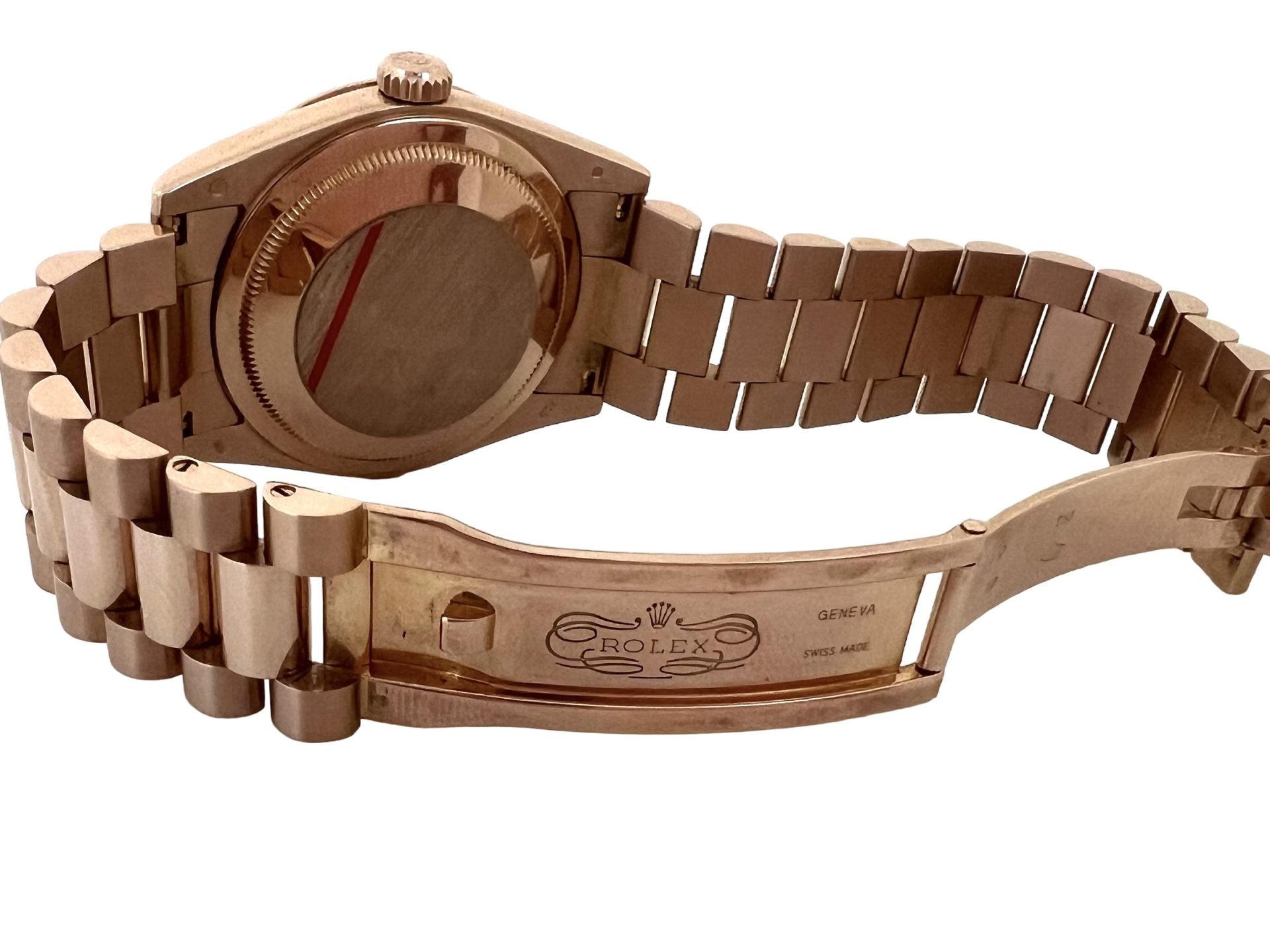 A Rolex Day Date rose gold watch with Tahitian mother-of-pearl dial