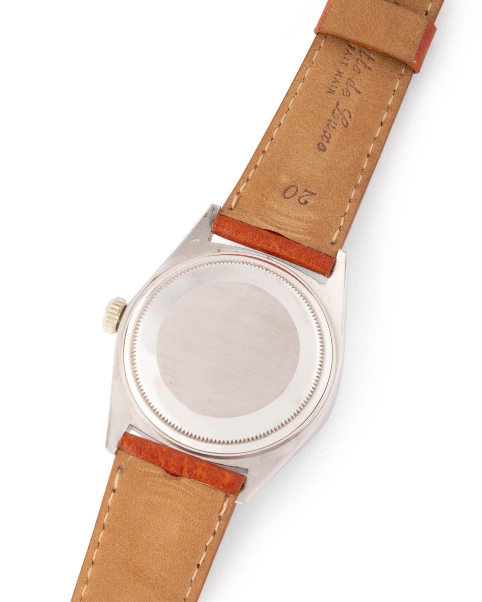 Rolex Day Date watch, in white gold and diamonds on leather