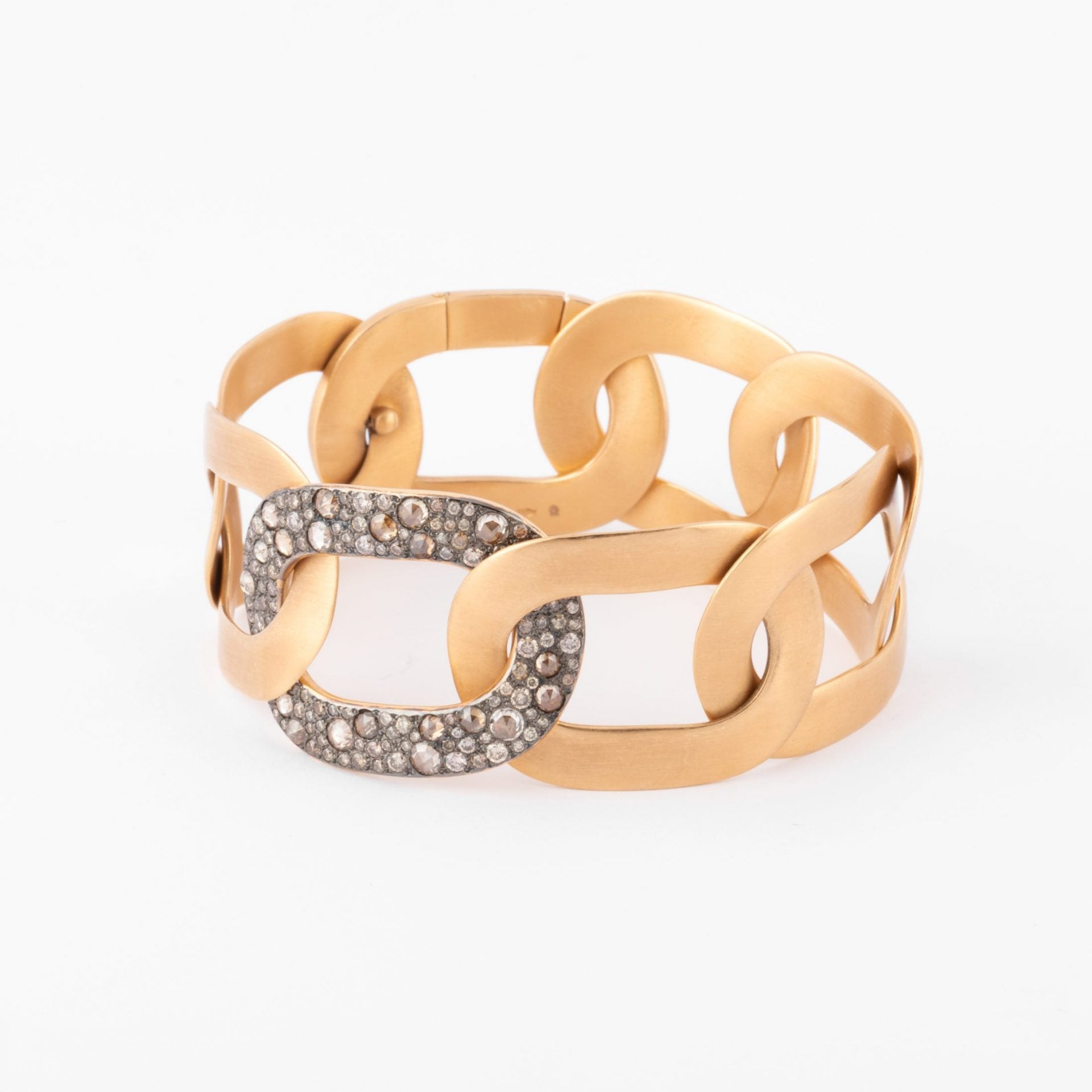 Pomellato, Pink gold bracelet with white and cognac diamonds from the house of Pomellato