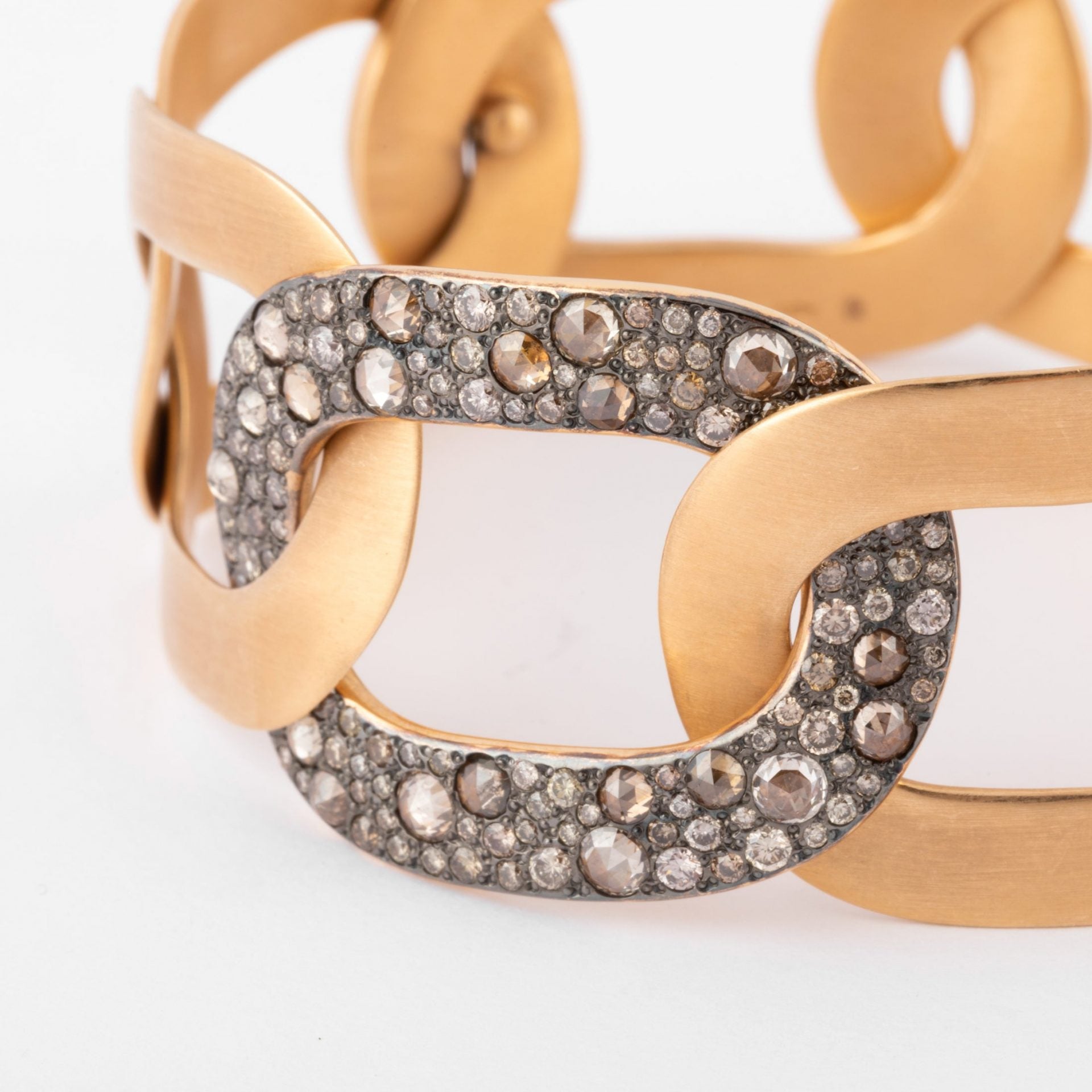 Pomellato, Pink gold bracelet with white and cognac diamonds from the house of Pomellato