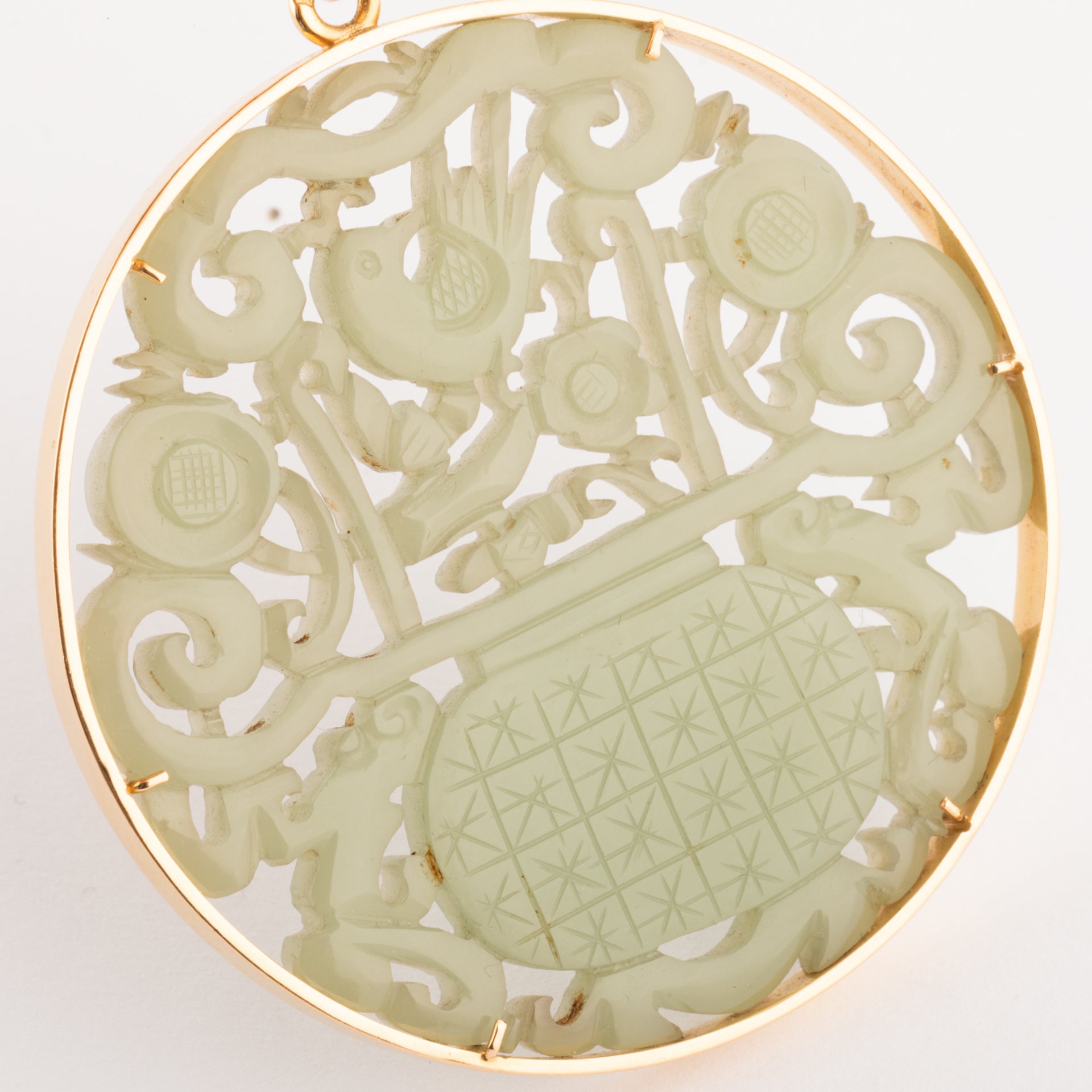 Jade pendant on 18K gold setting