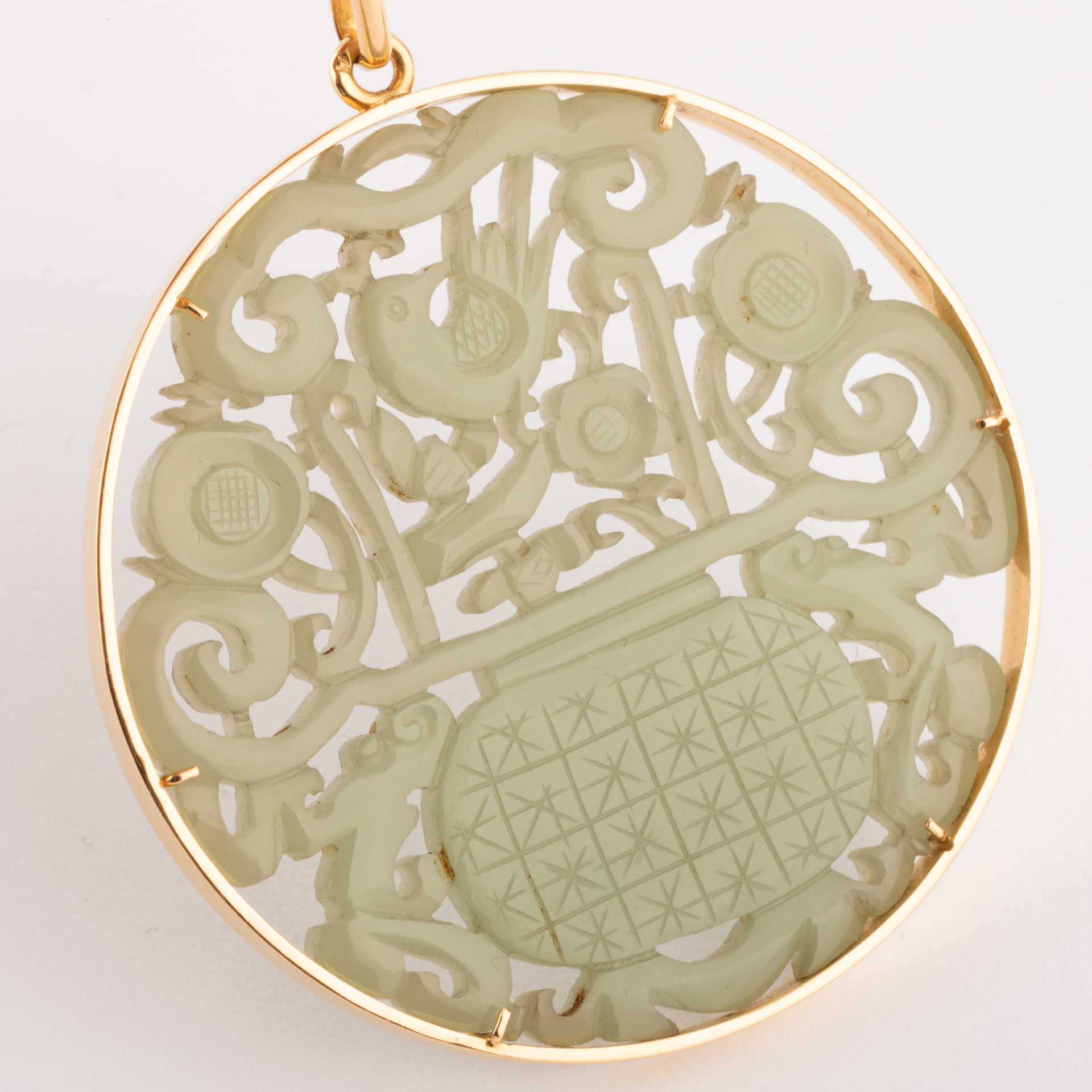 Jade pendant on 18K gold setting