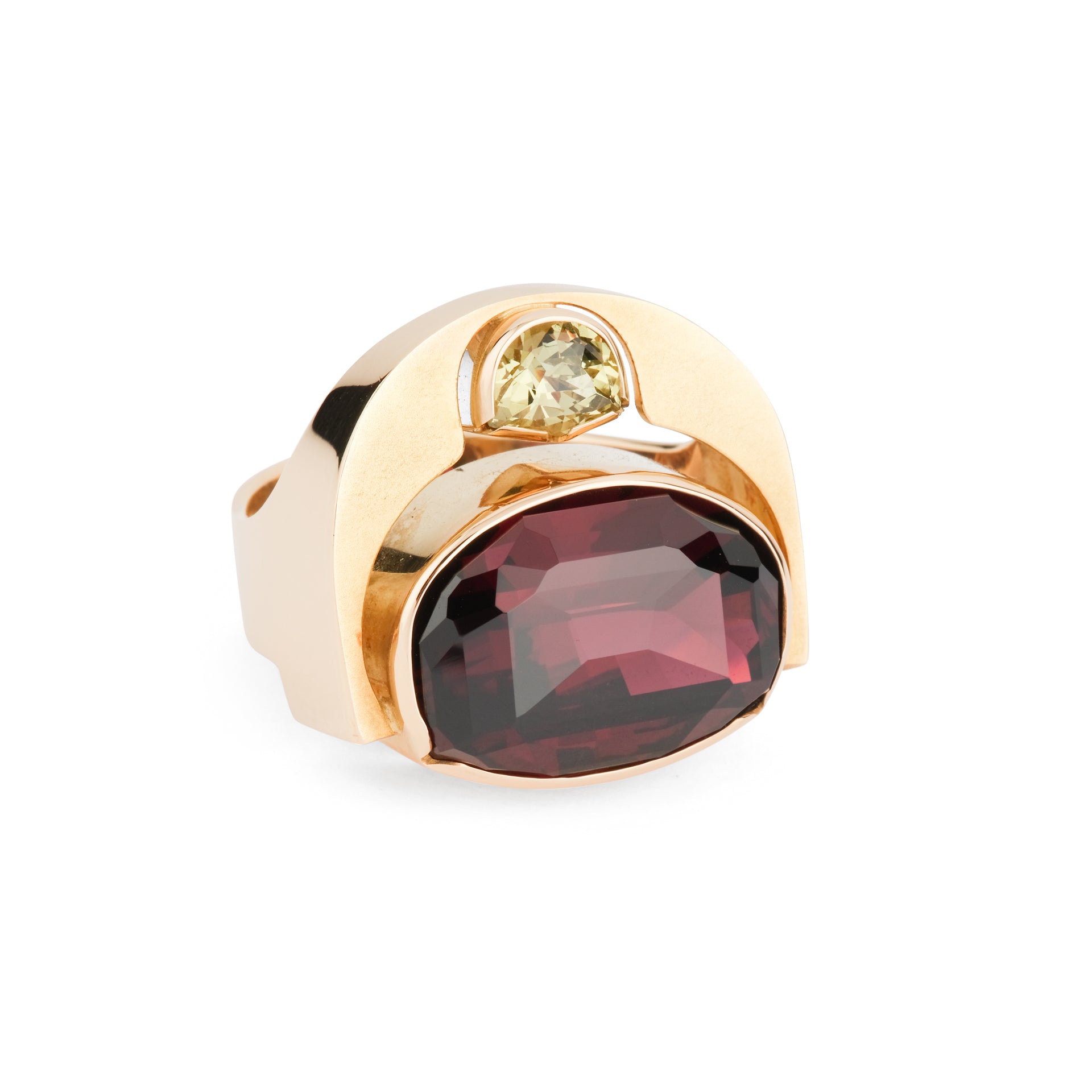 An Erwin Springbrunn ring in yellow gold, red and green garnet