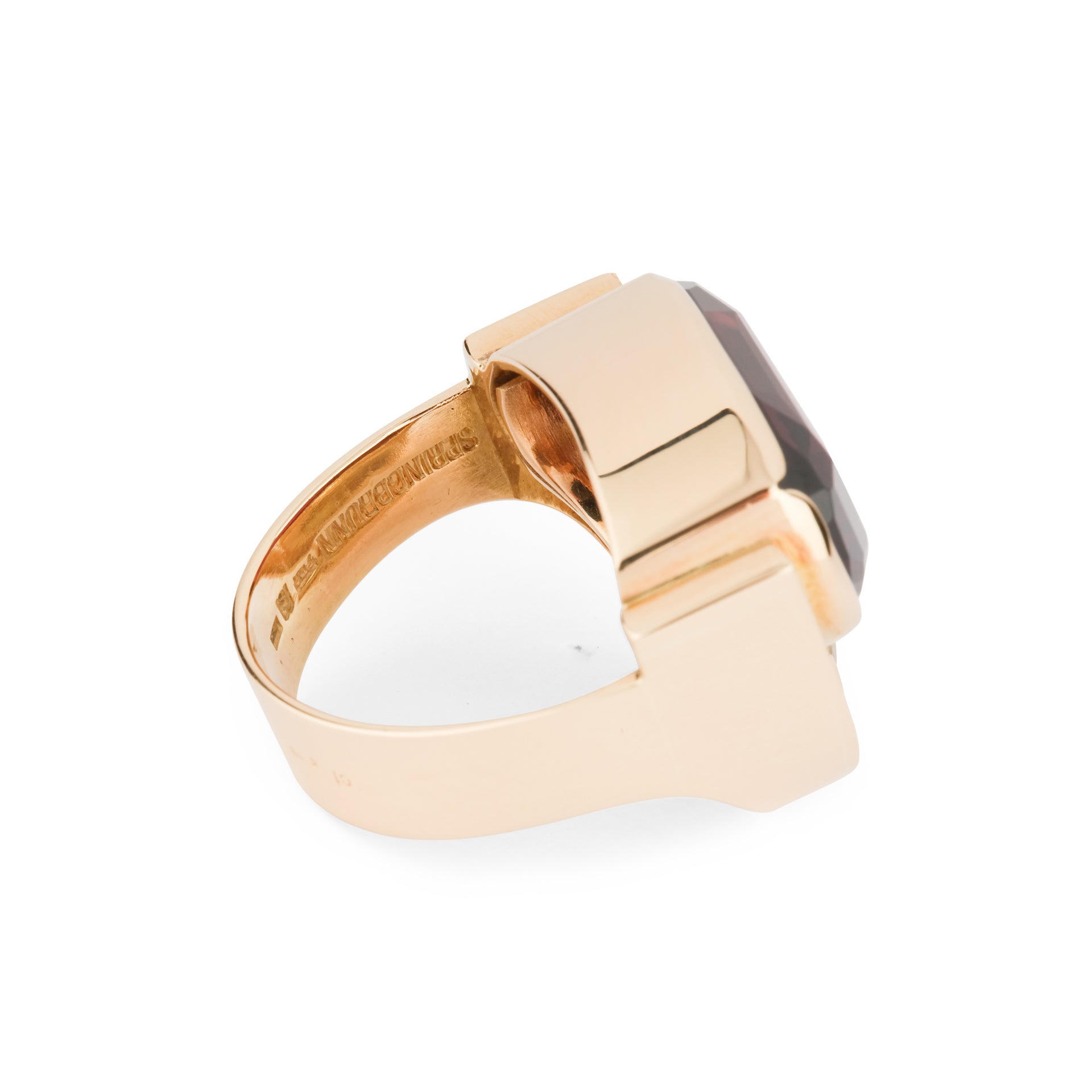 An Erwin Springbrunn ring in yellow gold, red and green garnet