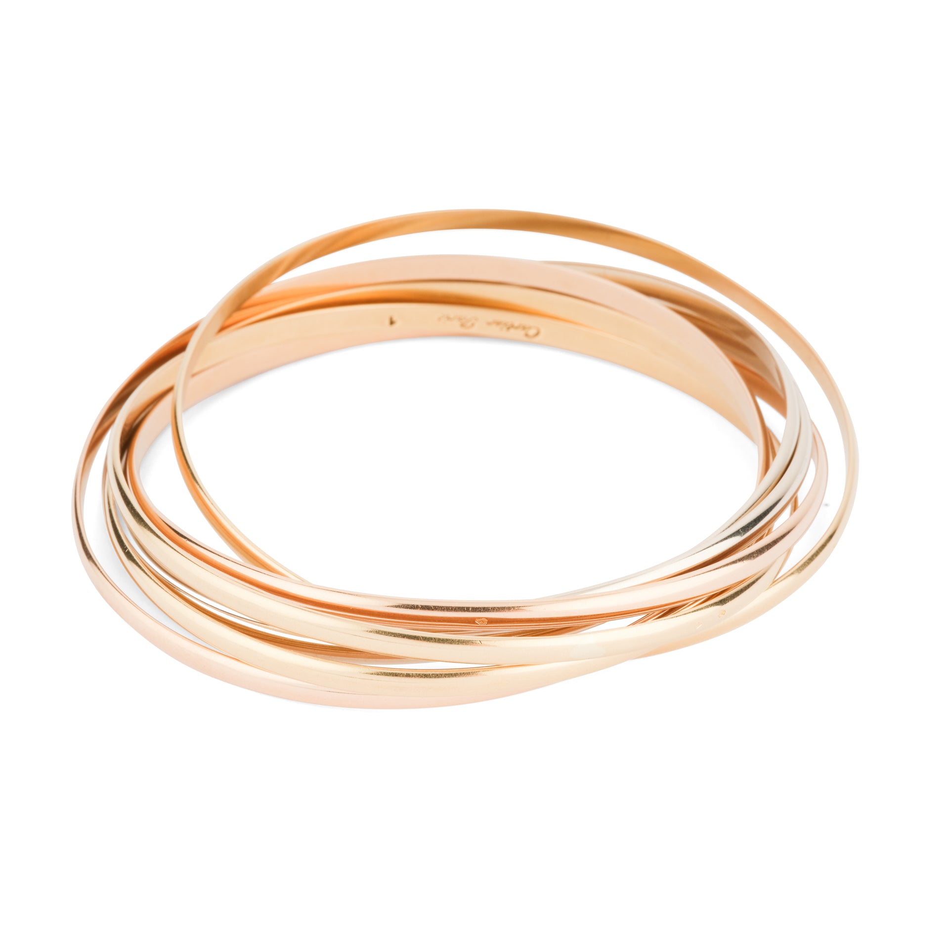 Cartier, un bracelet "Trinity", semainier.