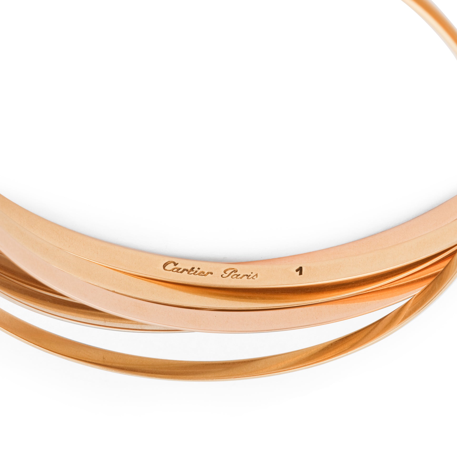 Cartier, un bracelet "Trinity", semainier.