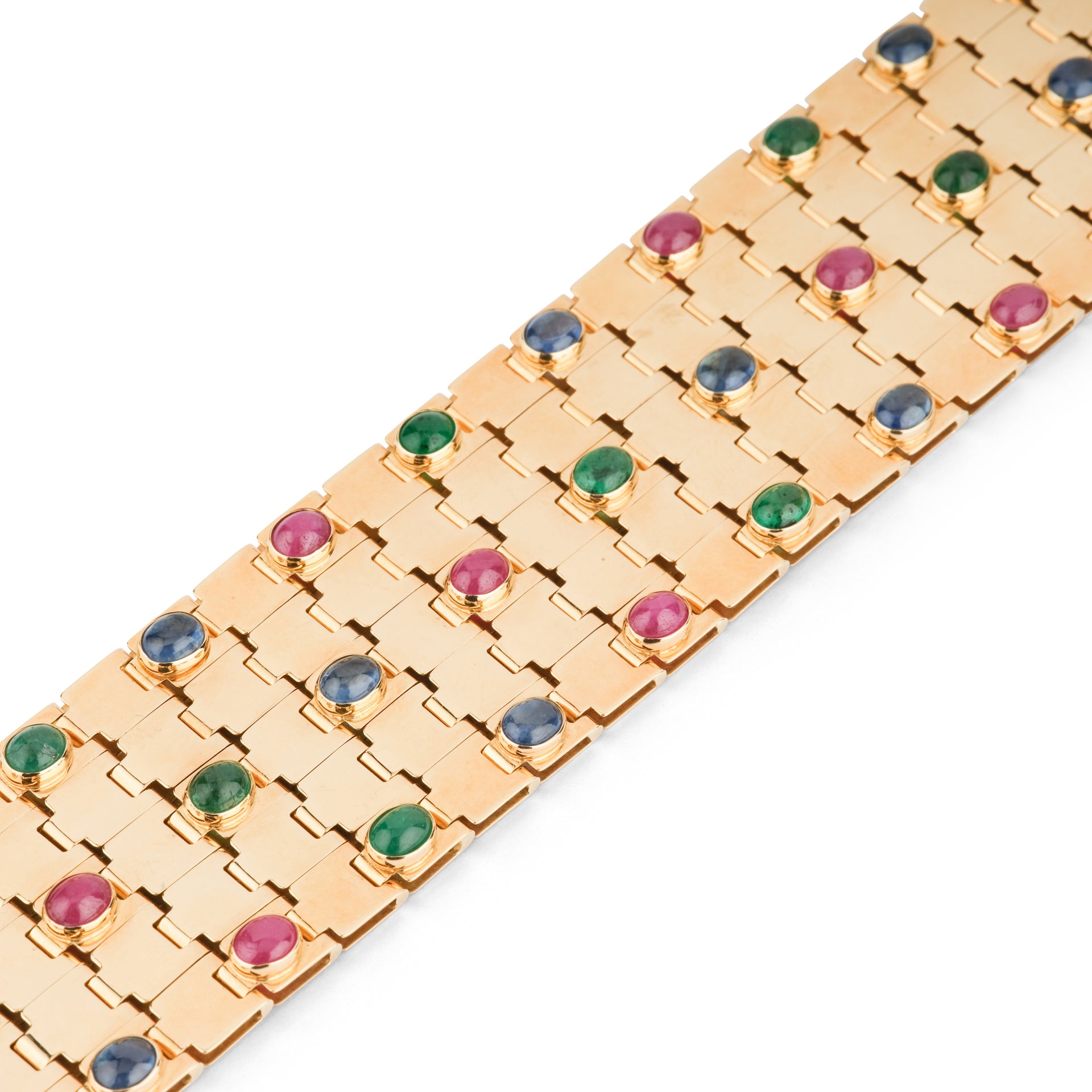 Un bracelet vintage signé Mario di Meola en or jaune et cabochon d'émeraudes, rubis et saphirs