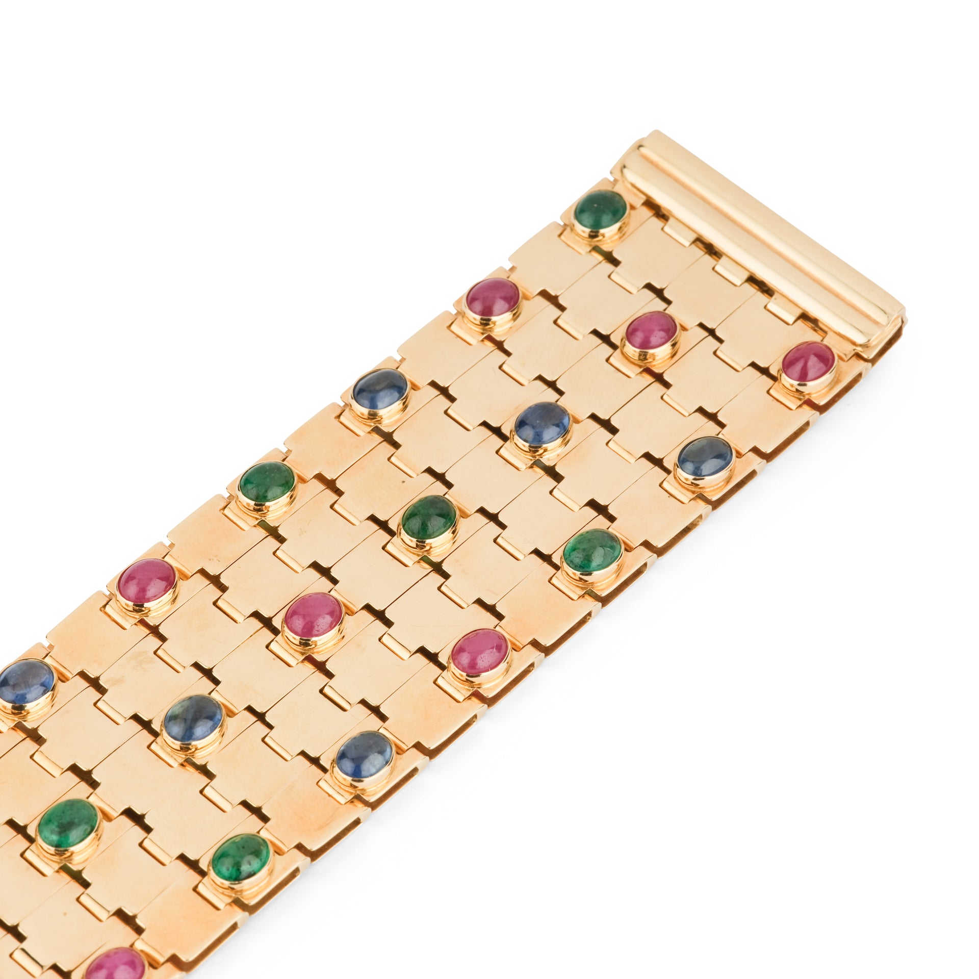 Un bracelet vintage signé Mario di Meola en or jaune et cabochon d'émeraudes, rubis et saphirs