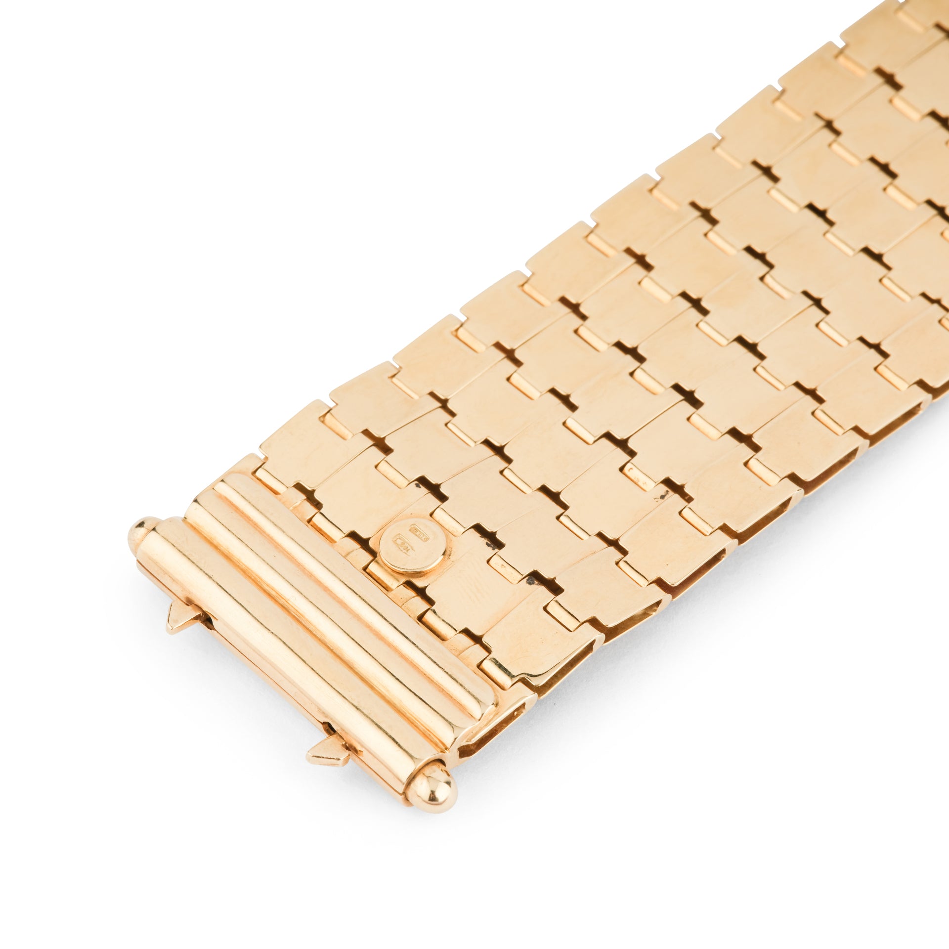 Un bracelet vintage signé Mario di Meola en or jaune et cabochon d'émeraudes, rubis et saphirs